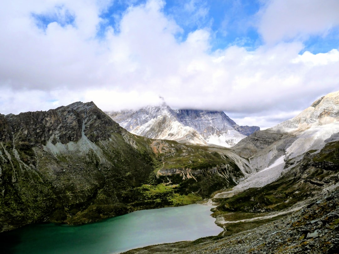 Yading Nature Reserve in Sichuan showing the dramatic alpine scenery that awaits nature-loving travelers in China