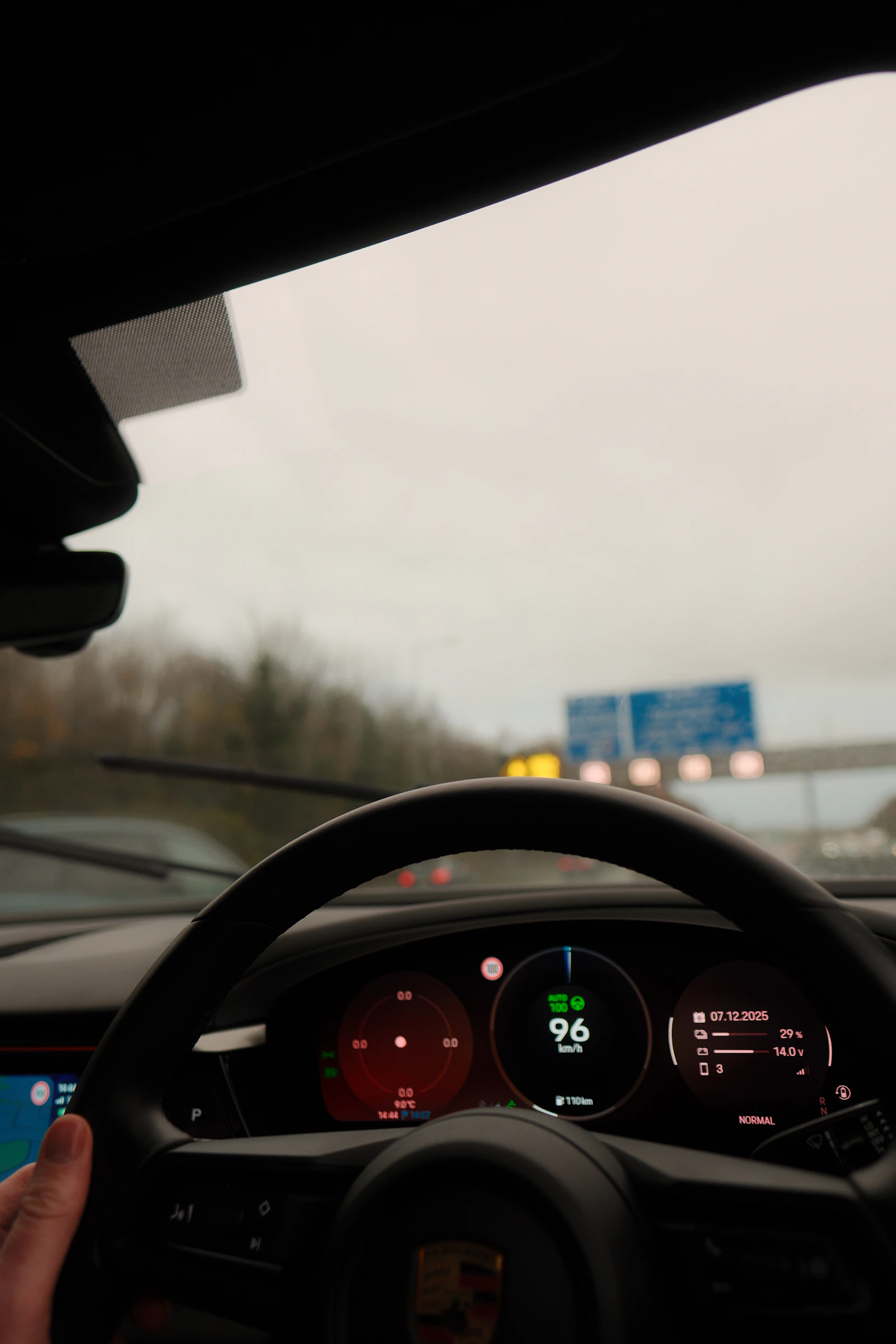 View from inside a modern vehicle while driving on an open road