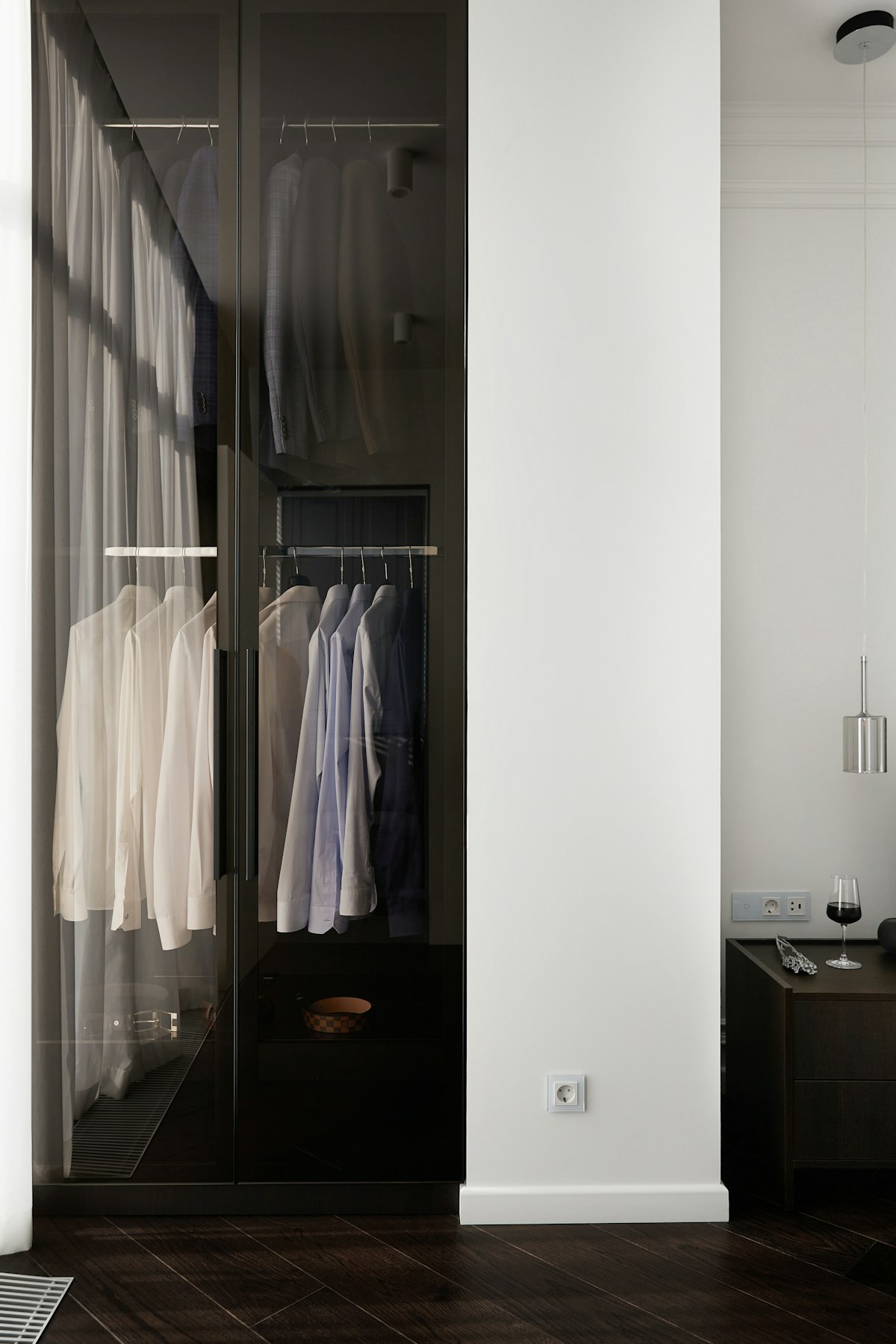 Organized closet with hanging shirts