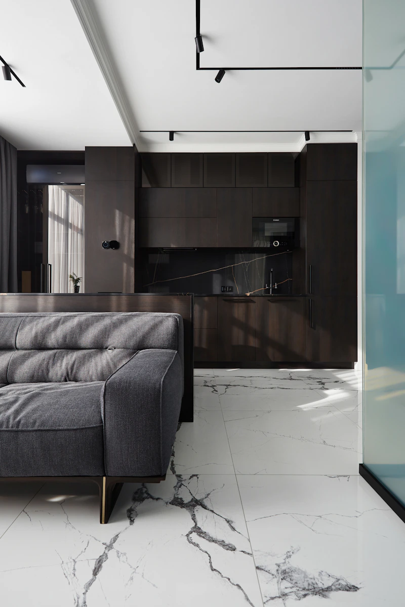 Stock demonstration image: Dark contemporary interior with marble flooring. Not a VRMMM Flooring project.
