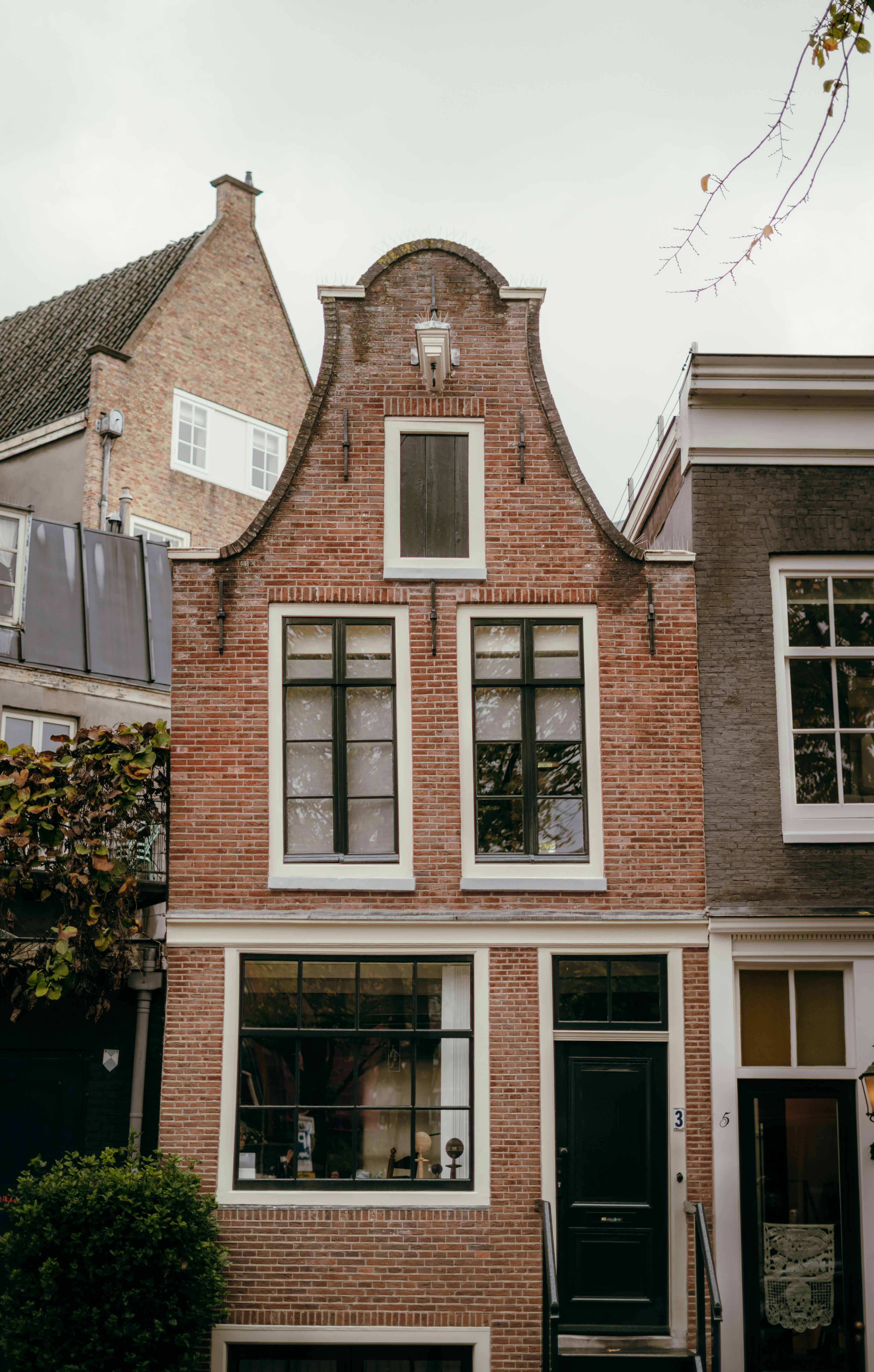 Historic brick house with stepped gable roof
