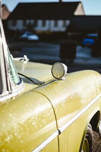Close-up of a vintage yellow car
