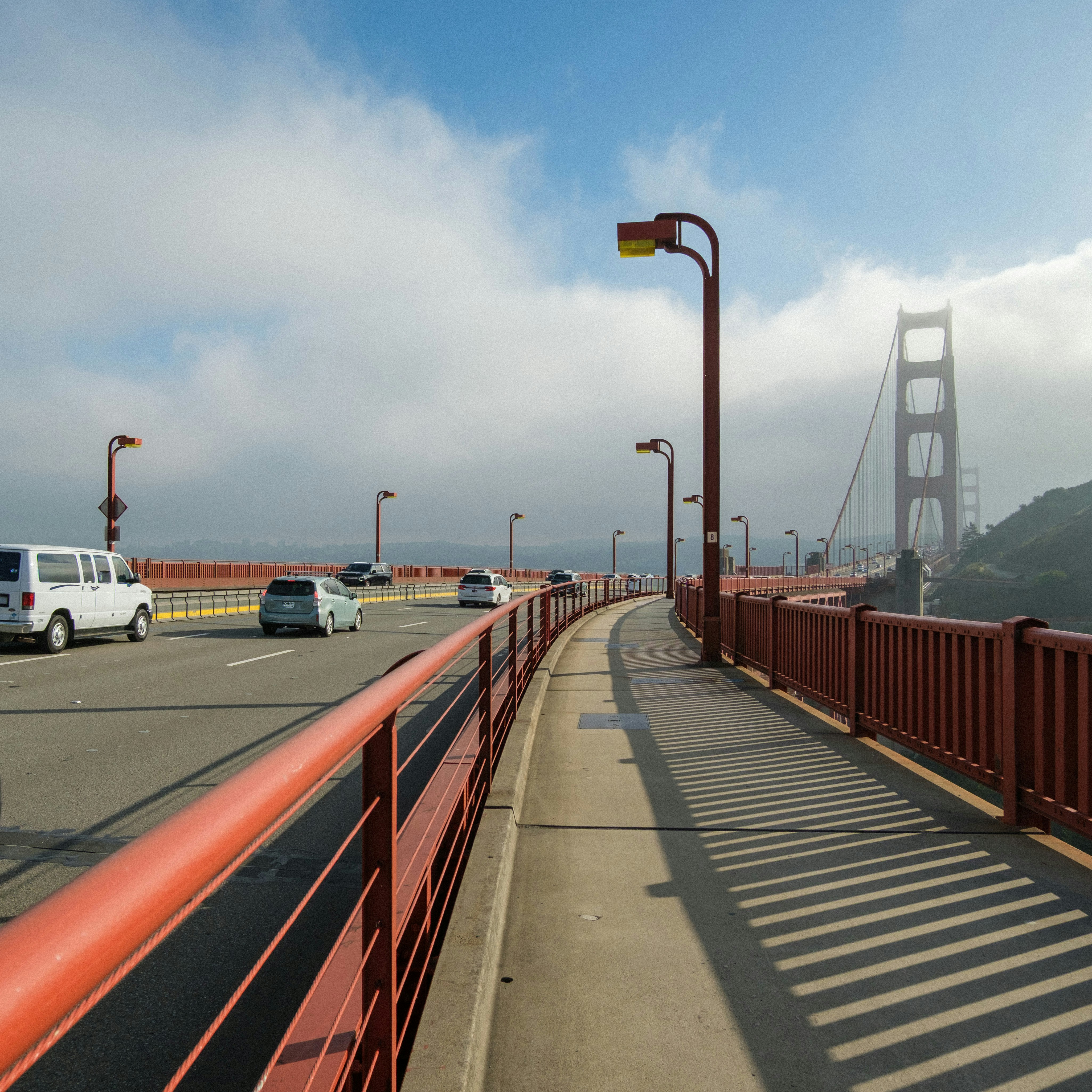 Golden gate bridge with traffic and fog photo – Free Travel Image on ...
