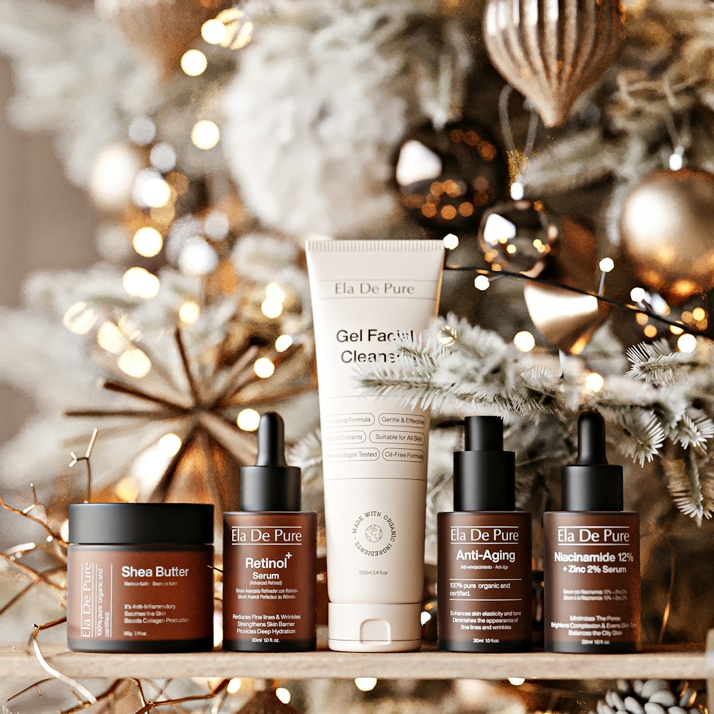 Skincare products arranged with festive holiday decorations.