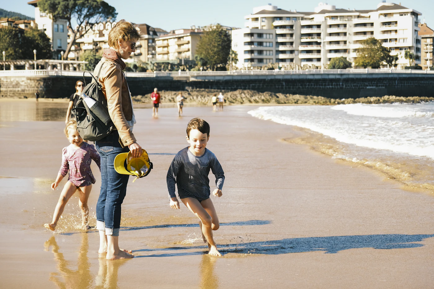 Family playing at the beach