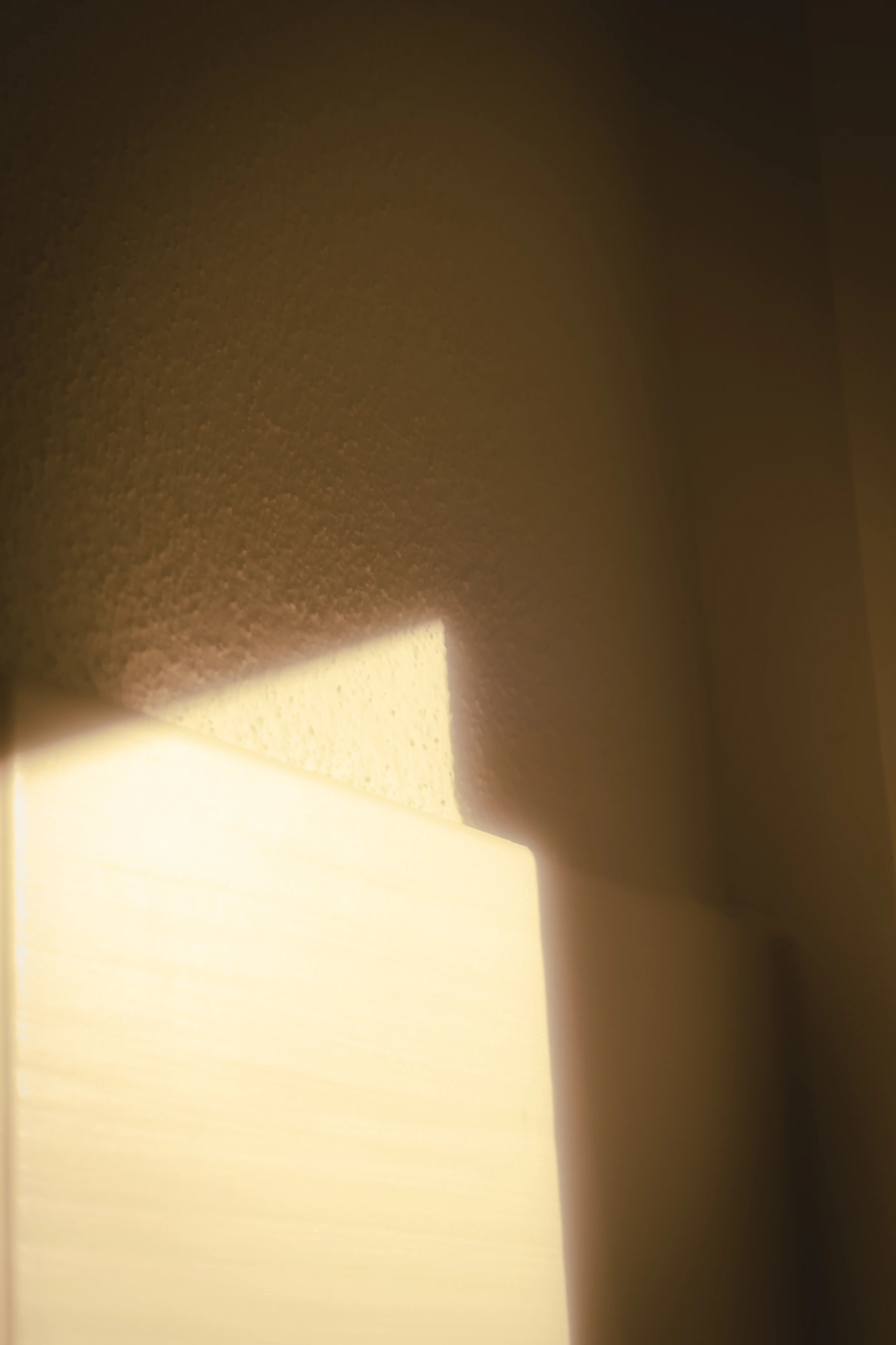 Long-form composition showing light, shadow, proportion, and calm material surfaces