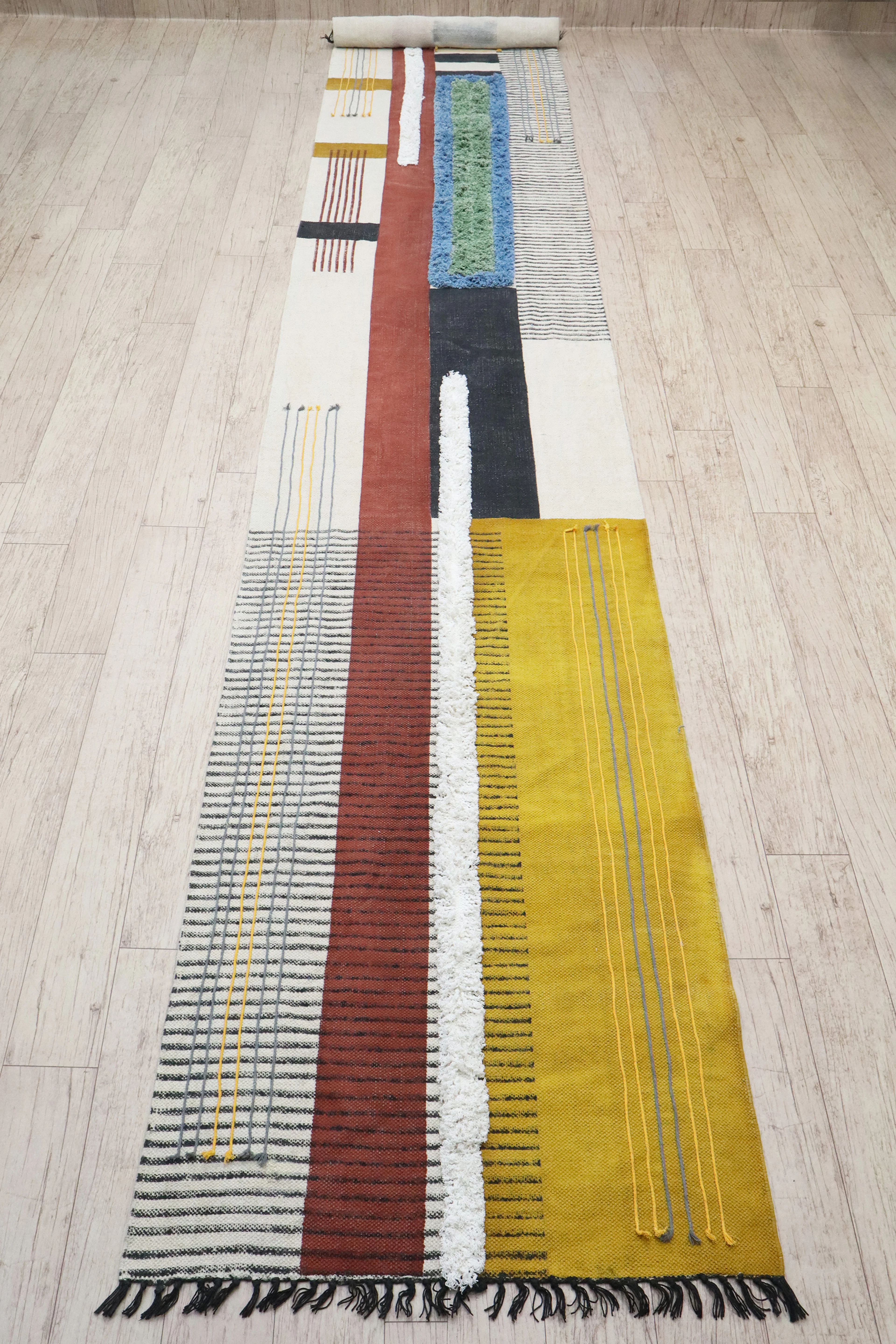 Runner with ochre, rust and black stripes