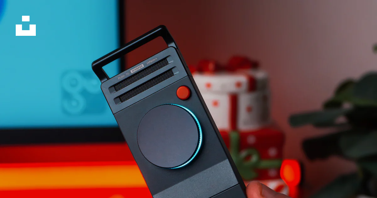 Large Grey Remote Control Hand holding a modern gray remote control device. photo – Free ...