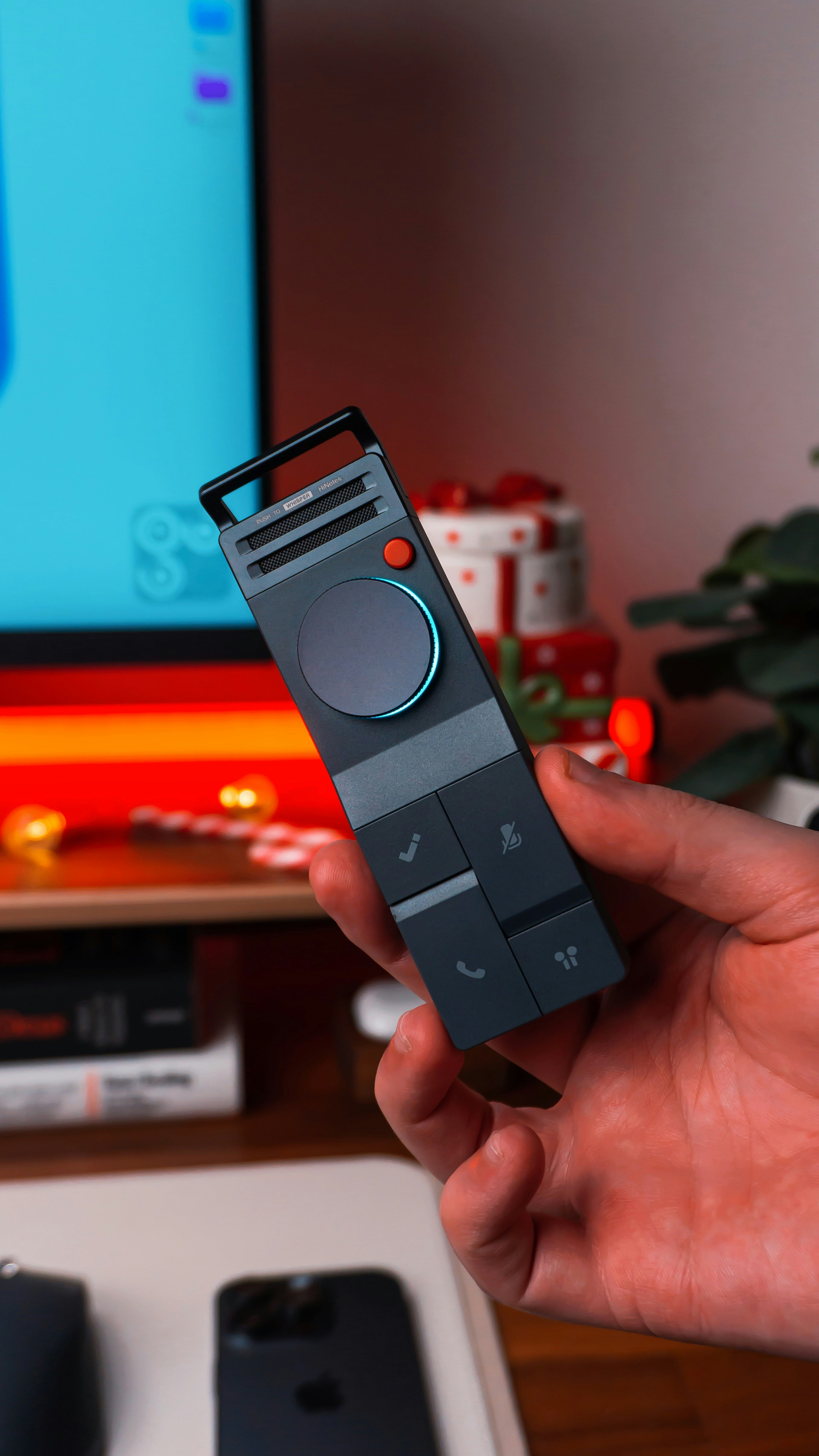 Hand holding a modern gray remote control with buttons. photo – Free ...
