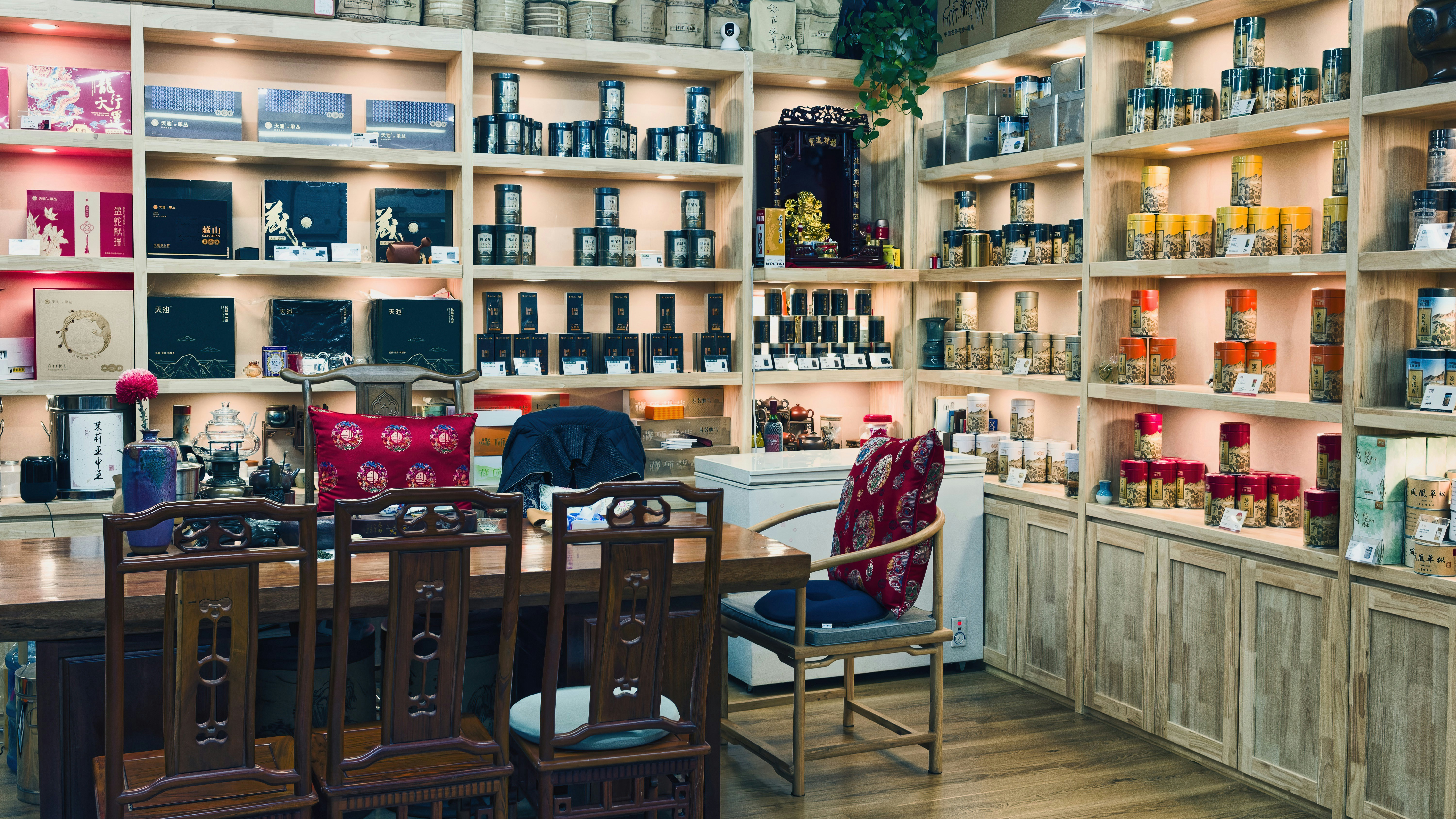 Shelves filled with bottles and boxes in a shop.