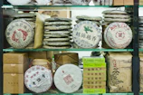 Stacks of round tea cakes on shelves