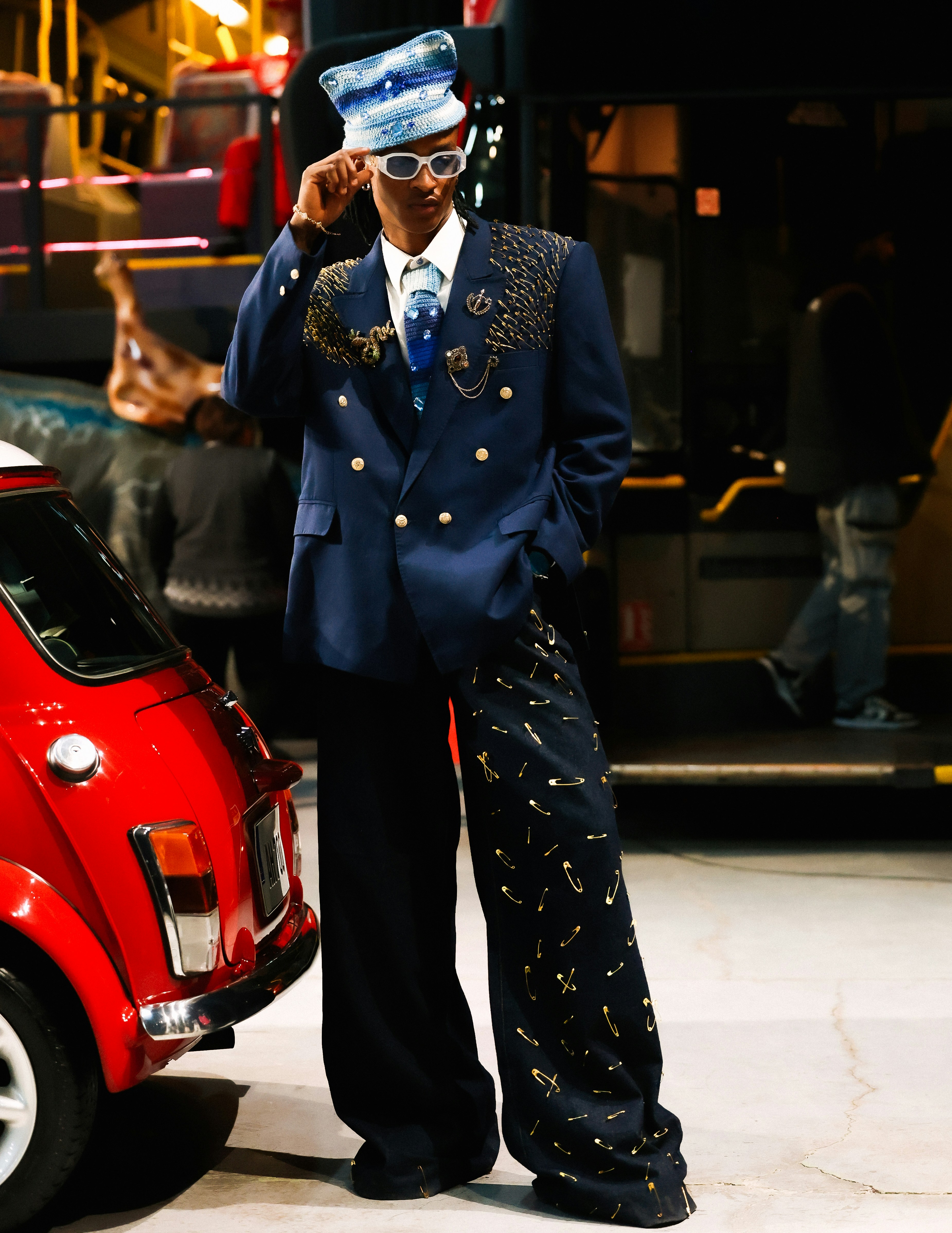 Man in stylish blue suit and patterned pants