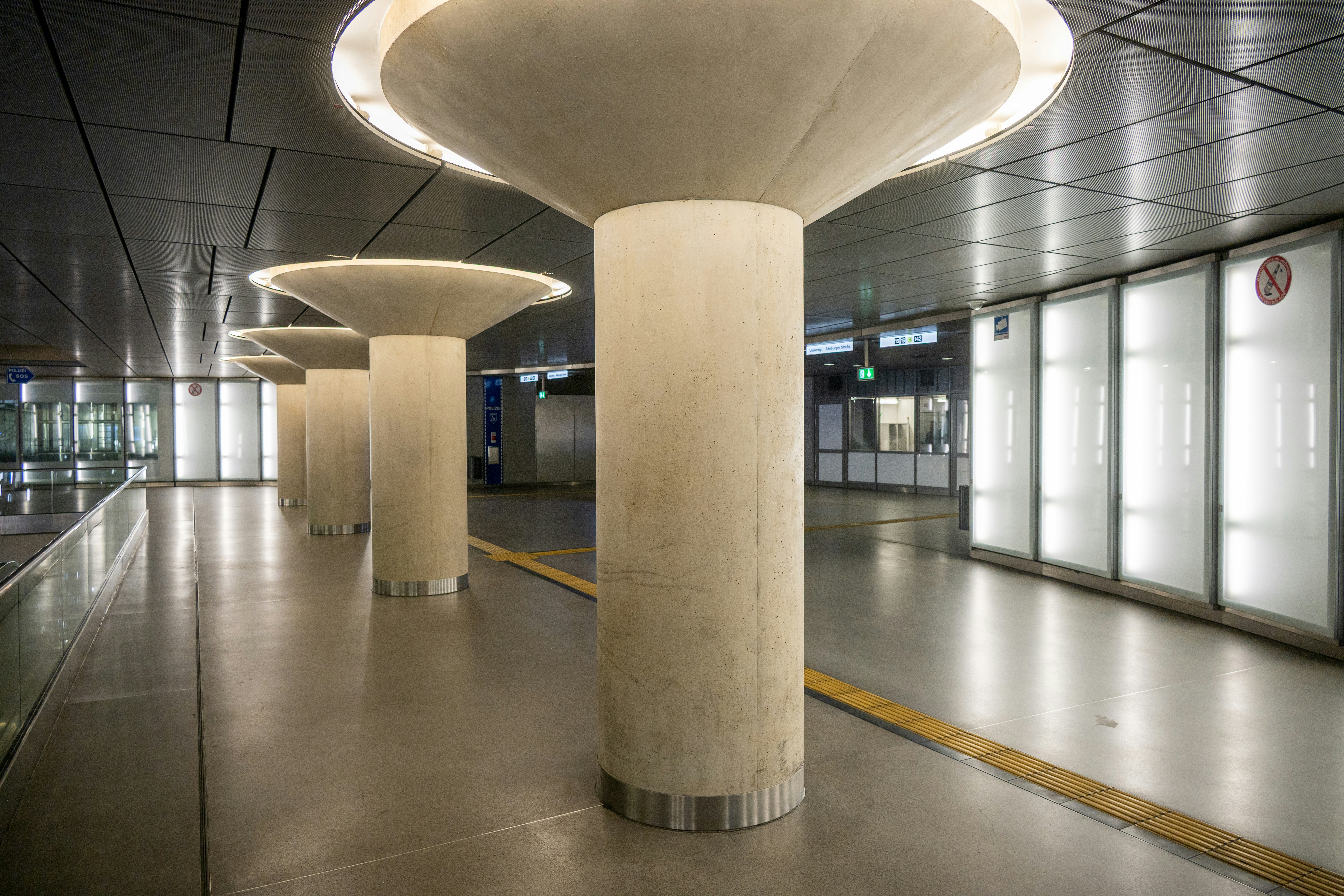 Modern concrete columns in a well-lit station