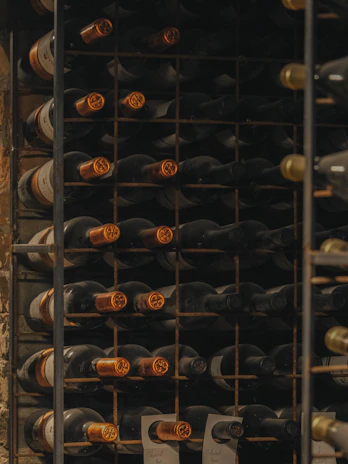 Bottles of wine stored on a rack