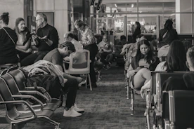 People waiting in an airport terminal