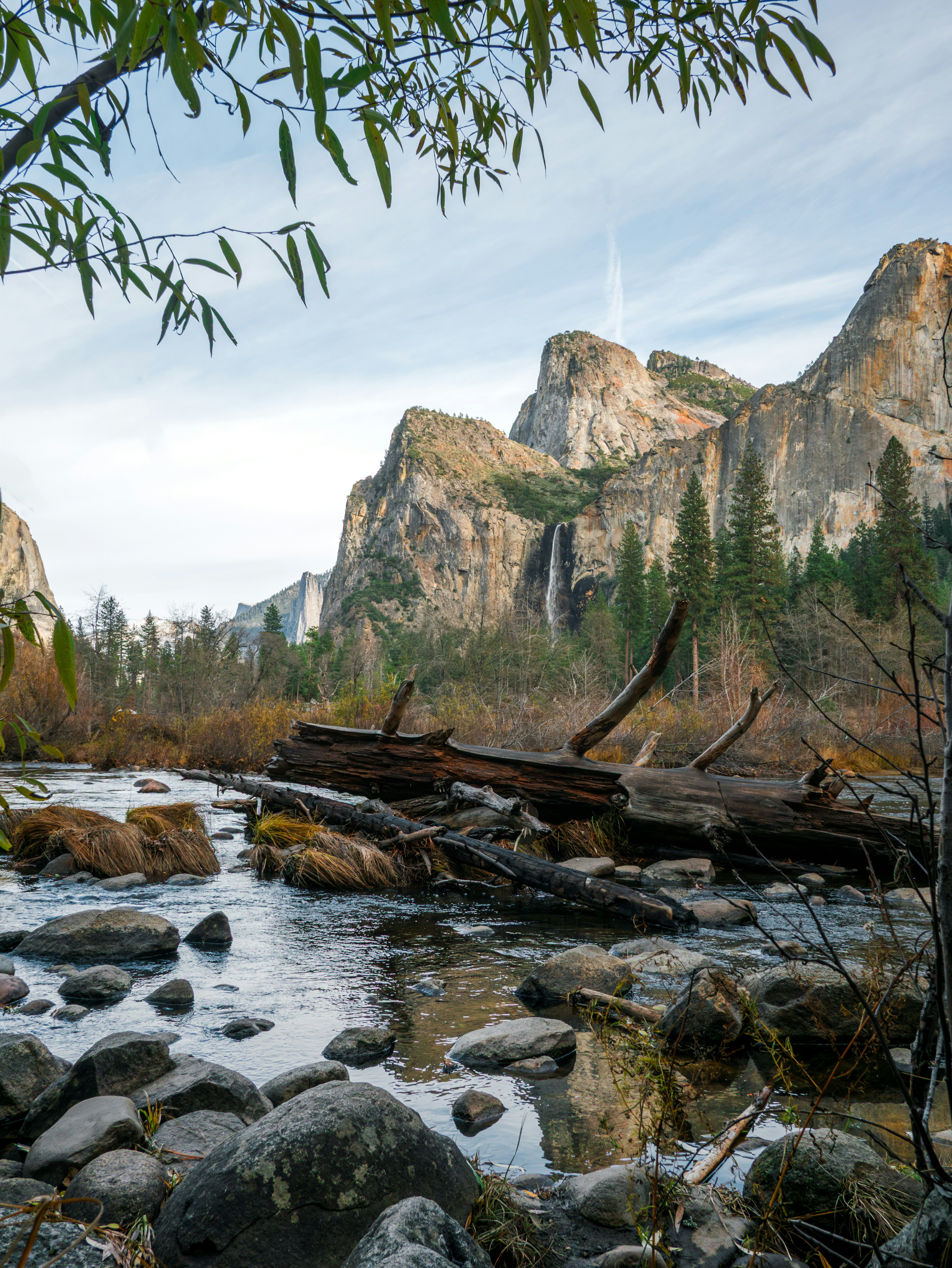 River flowing through a rocky landscape with mountains.