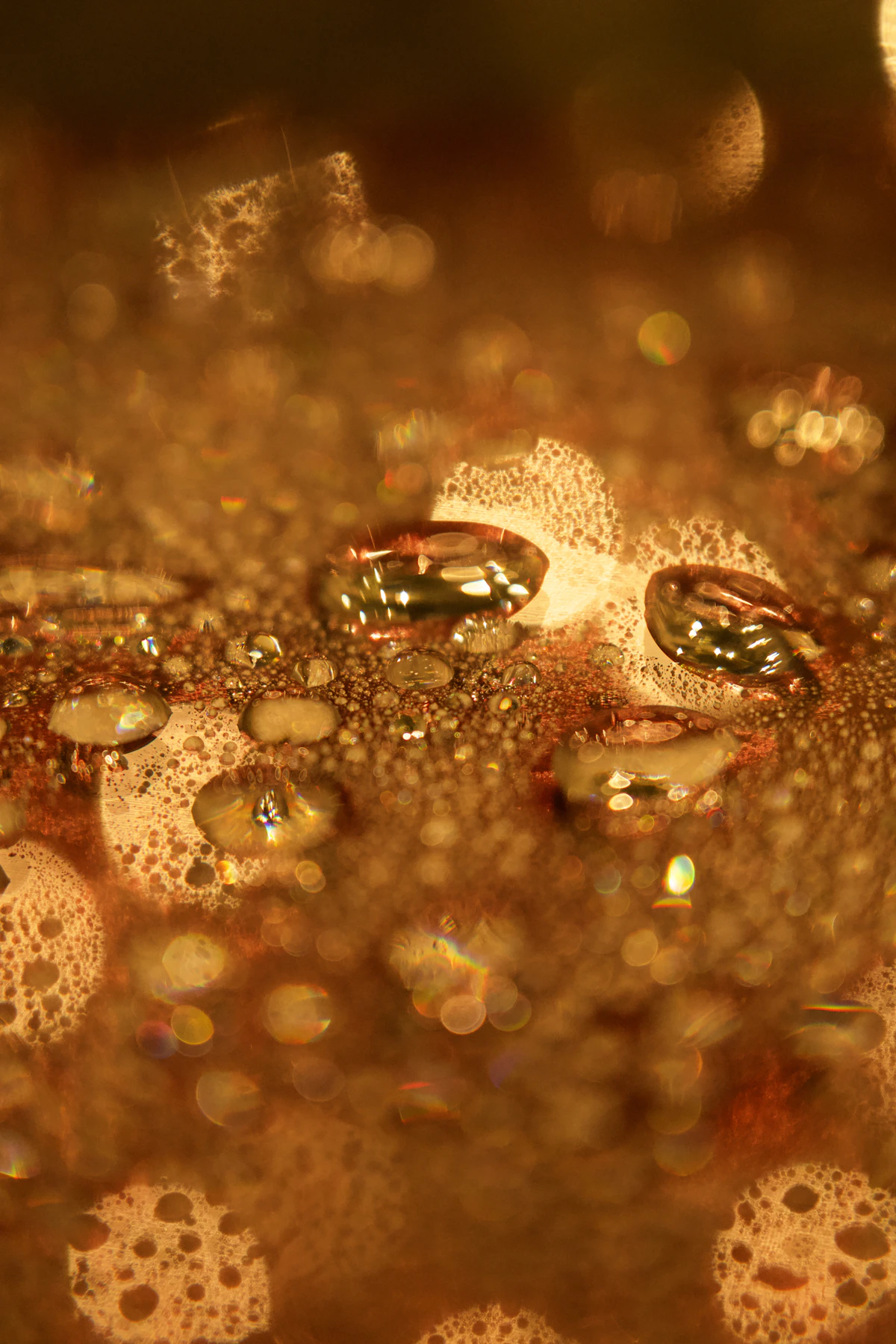Glossy 24K gold droplets — signature ingredient