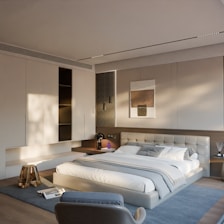 Modern bedroom with a large bed and minimalist decor.
