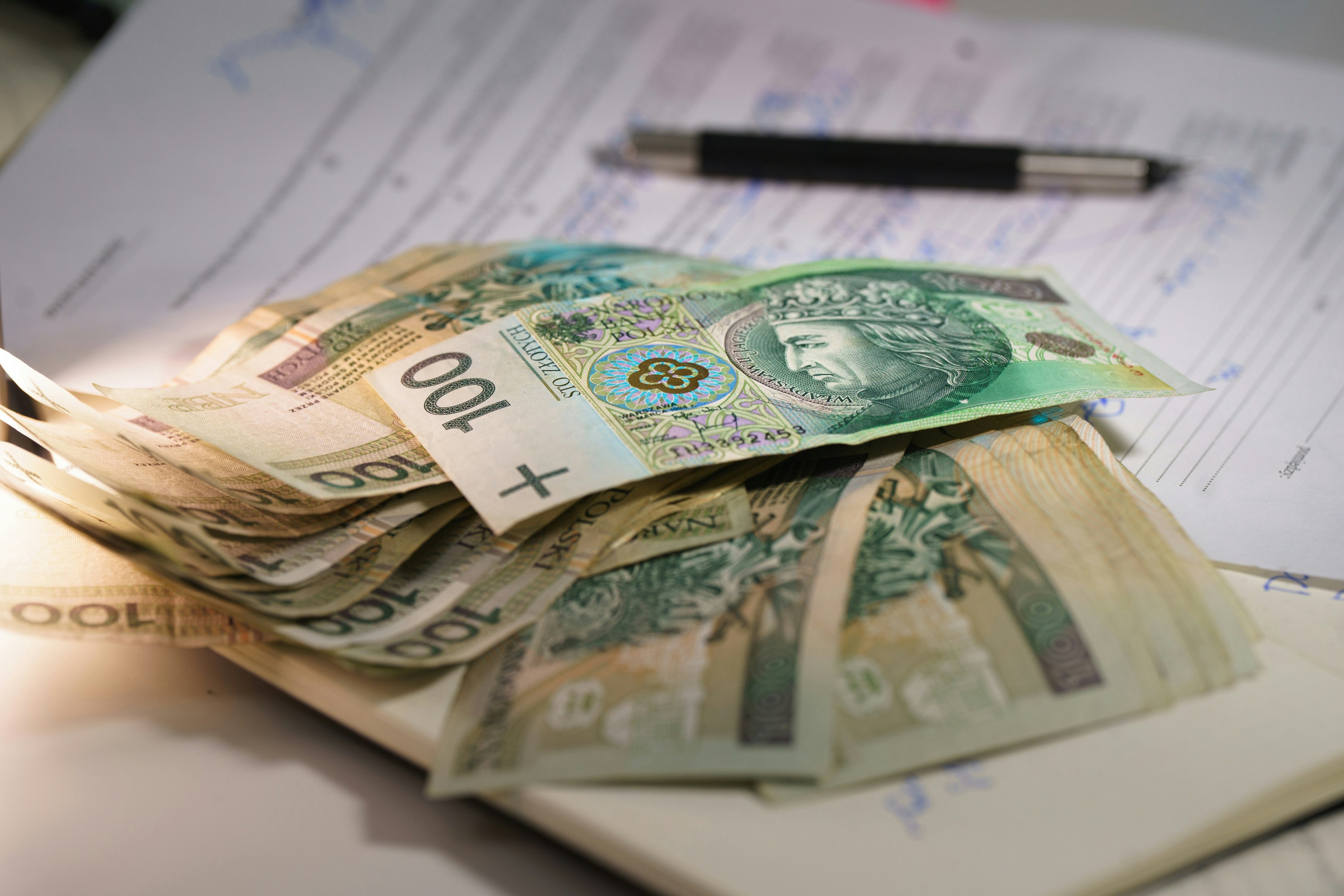 Polish currency finance contracts bills prices. Financial documents agreements cost calculation expense control payment obligations accounting business economy Europe Poland