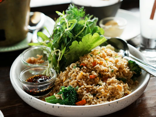 Fried rice with broccoli and fresh greens
