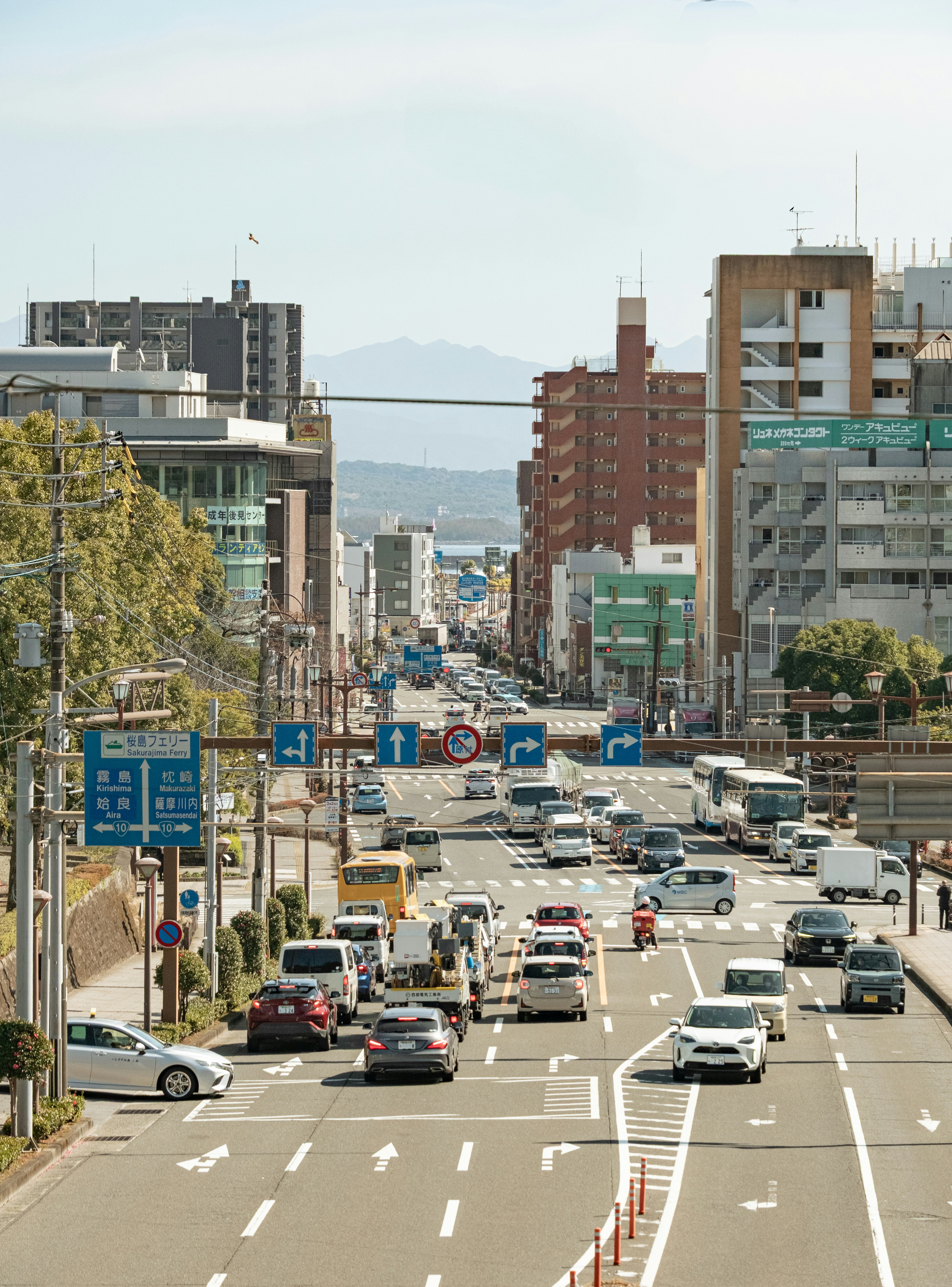 Busy city street with traffic and buildings