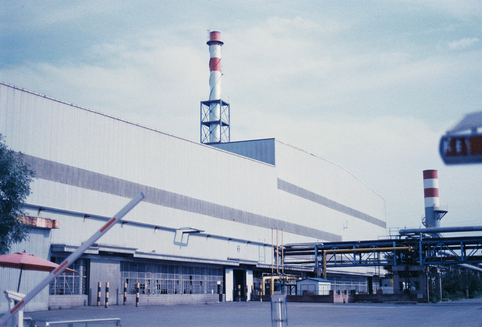 Industrial manufacturing facility representing the operating environment affected by program decisions