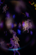 Abstract bokeh figures with goat-like shapes
