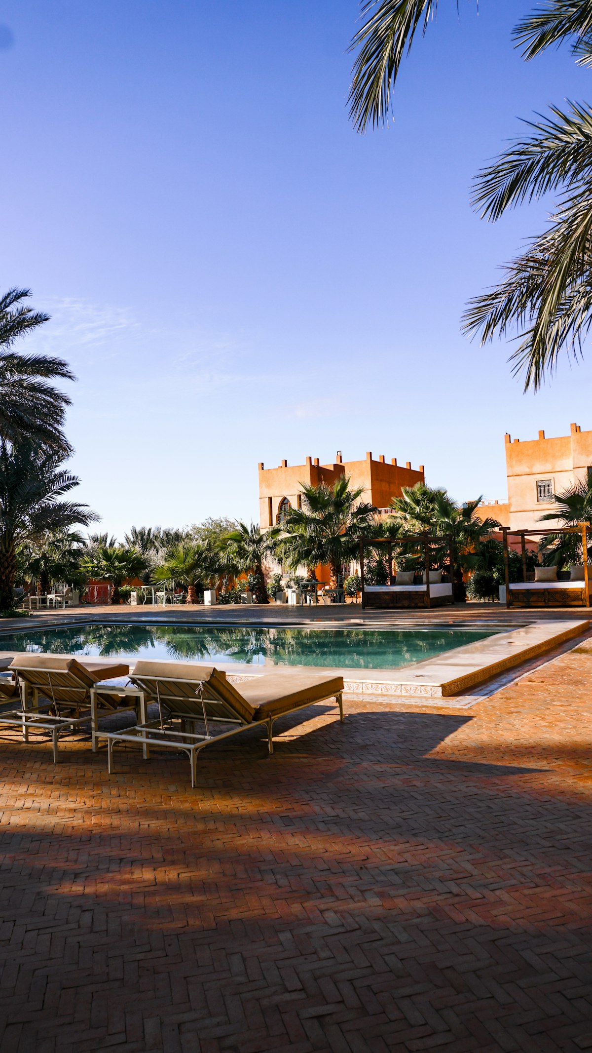 Inspiration photograph of a pool setting; not a photograph of Gran Tacande Wellness & Relax