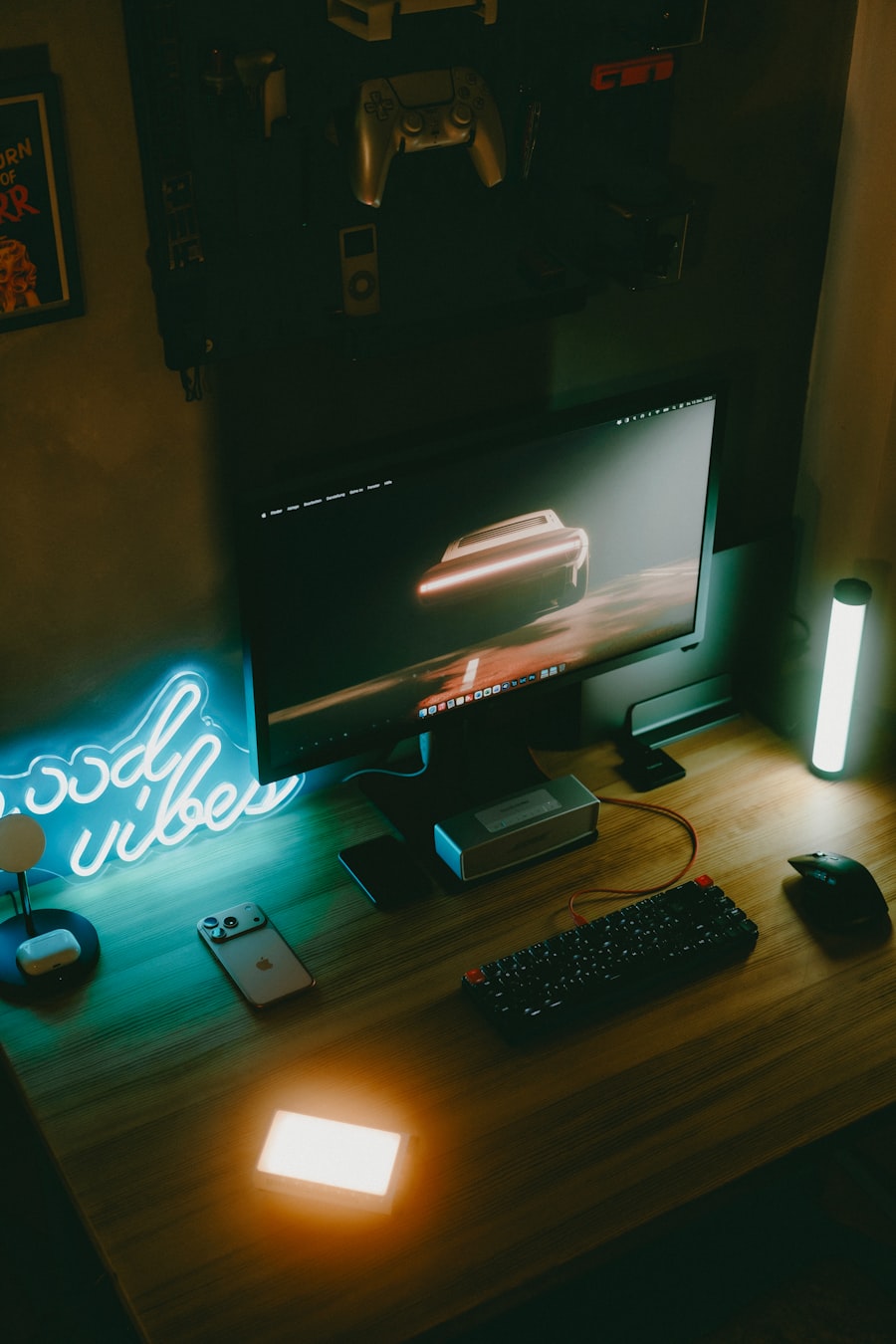 Gaming setup with neon lighting and multiple monitors