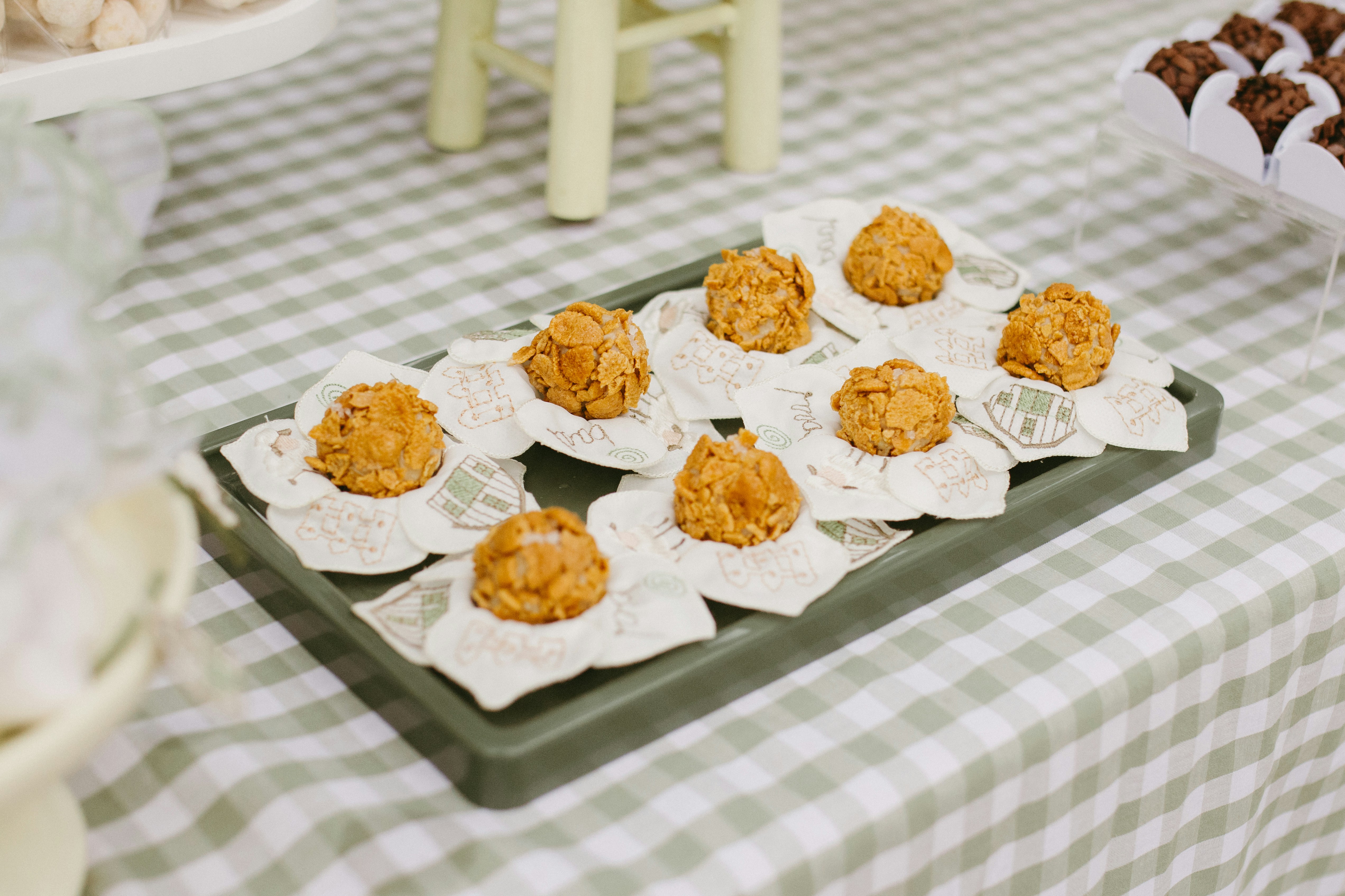 Small round cookies arranged on a tray