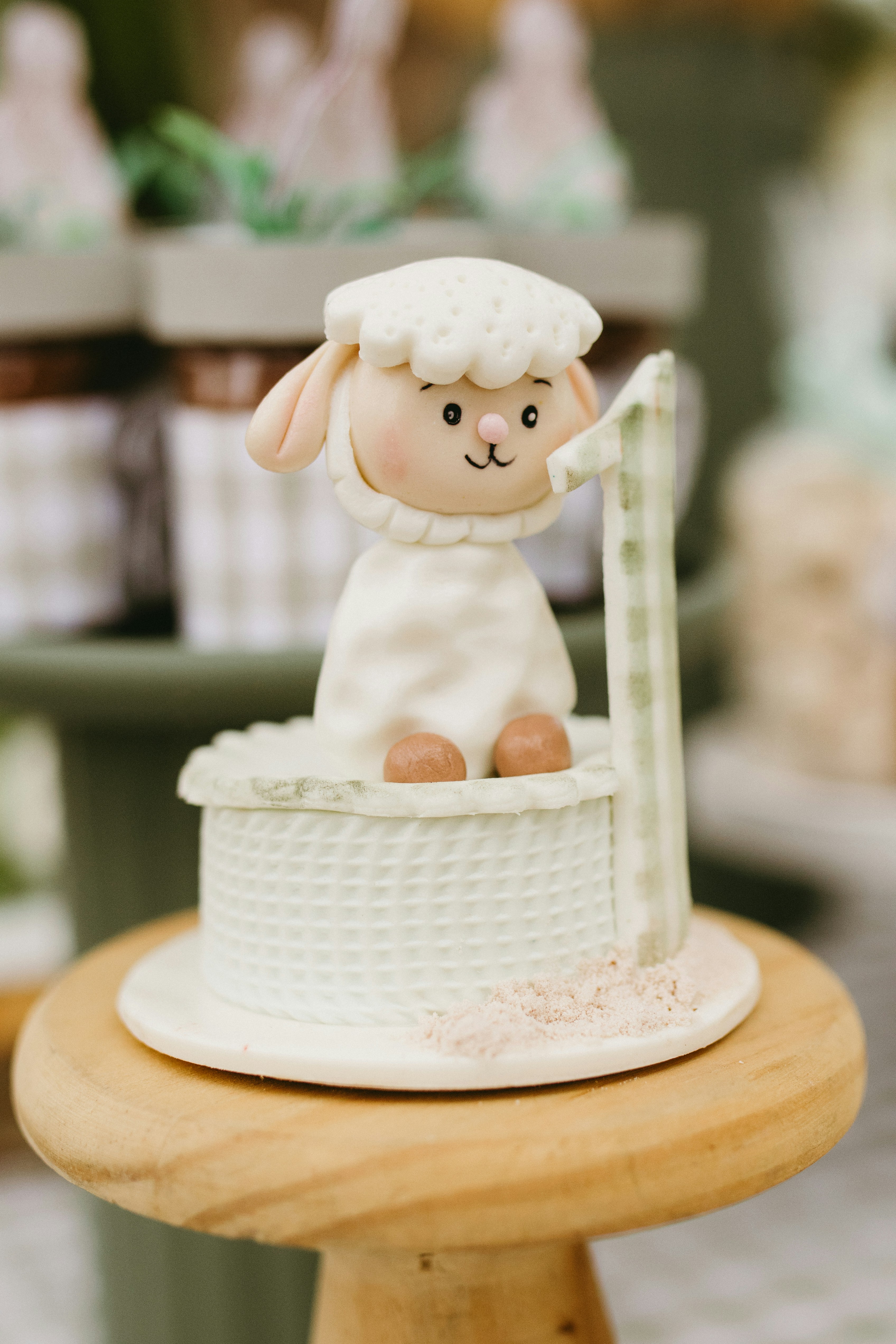 A cute sheep figurine in a basket