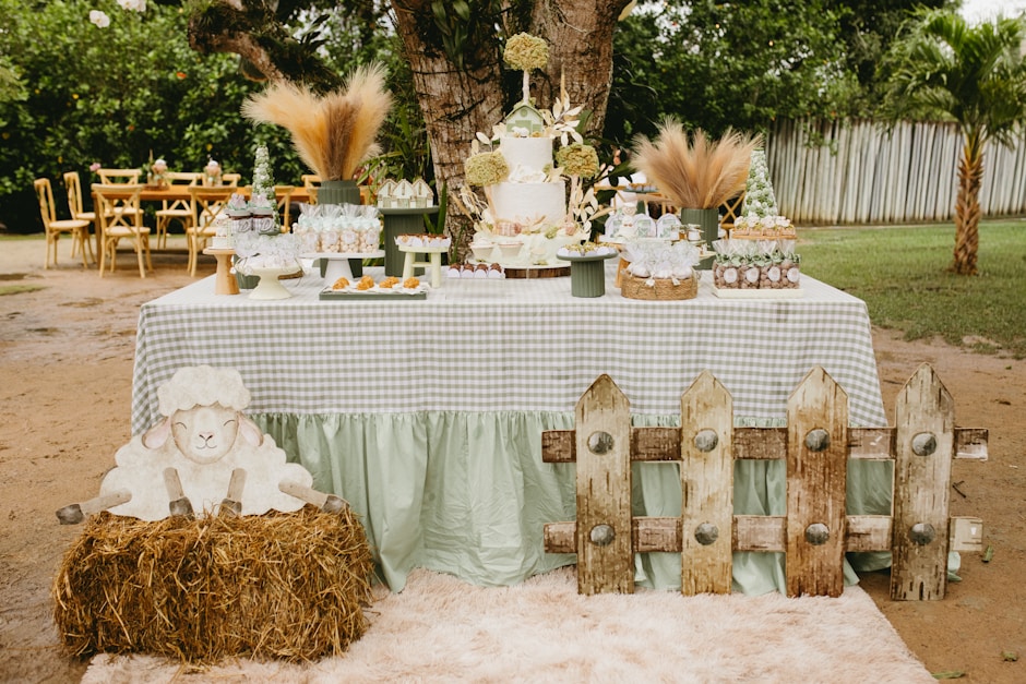 Farm-themed party dessert table with cake and treats.