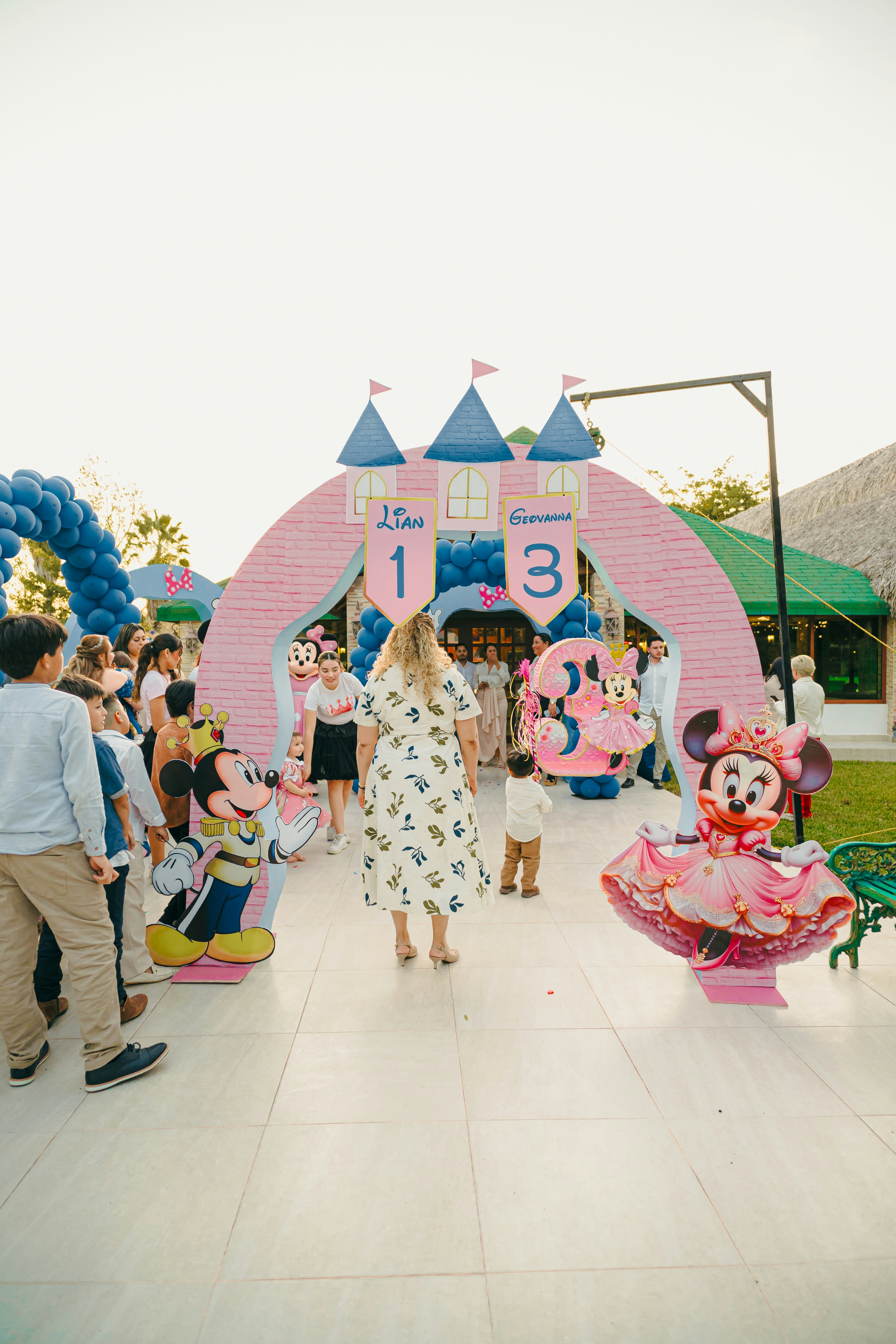 Minnie mouse themed birthday party entrance with castle entrance