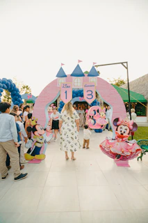 Minnie mouse themed birthday party entrance with castle entrance