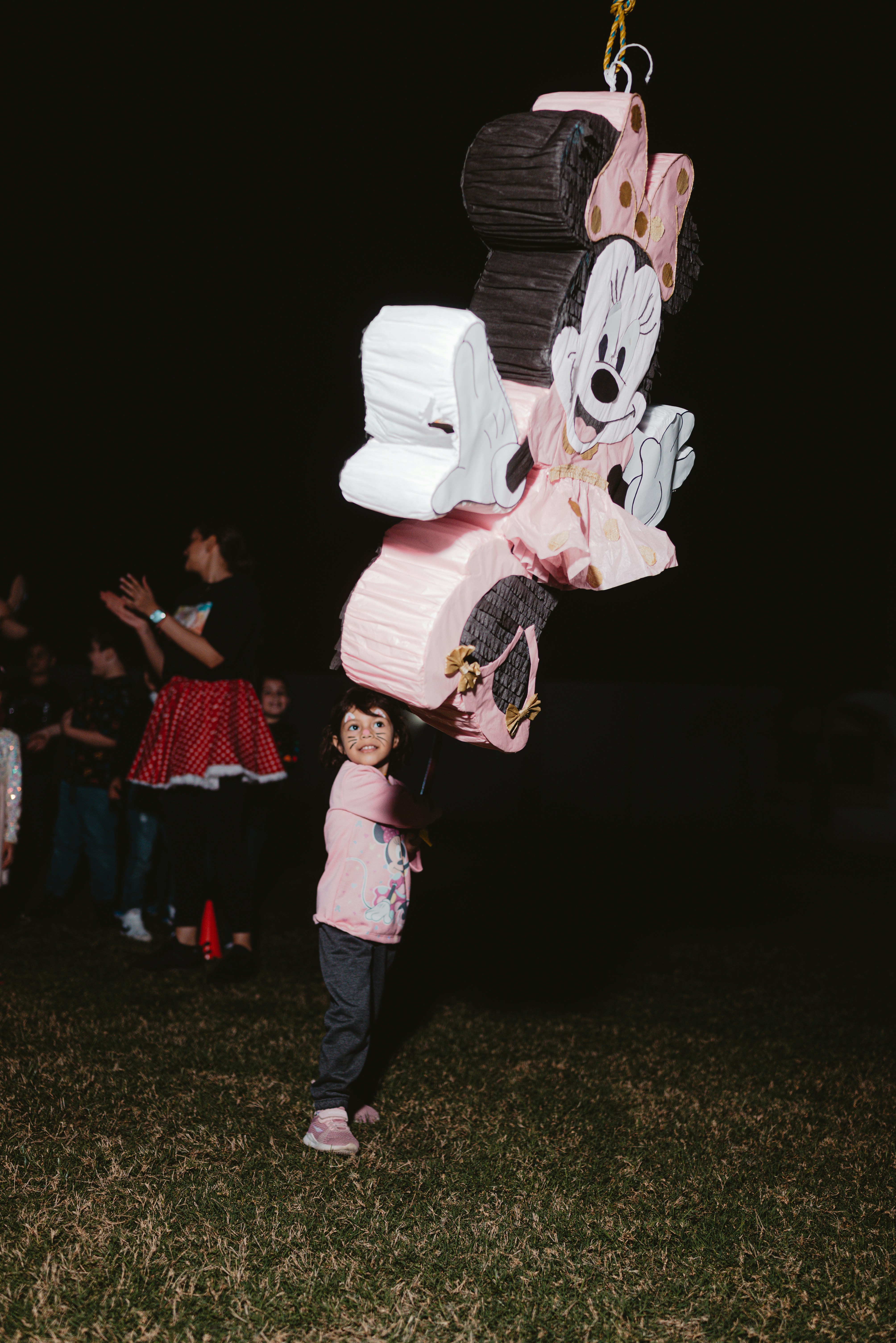 Baby in football suit at a themed party