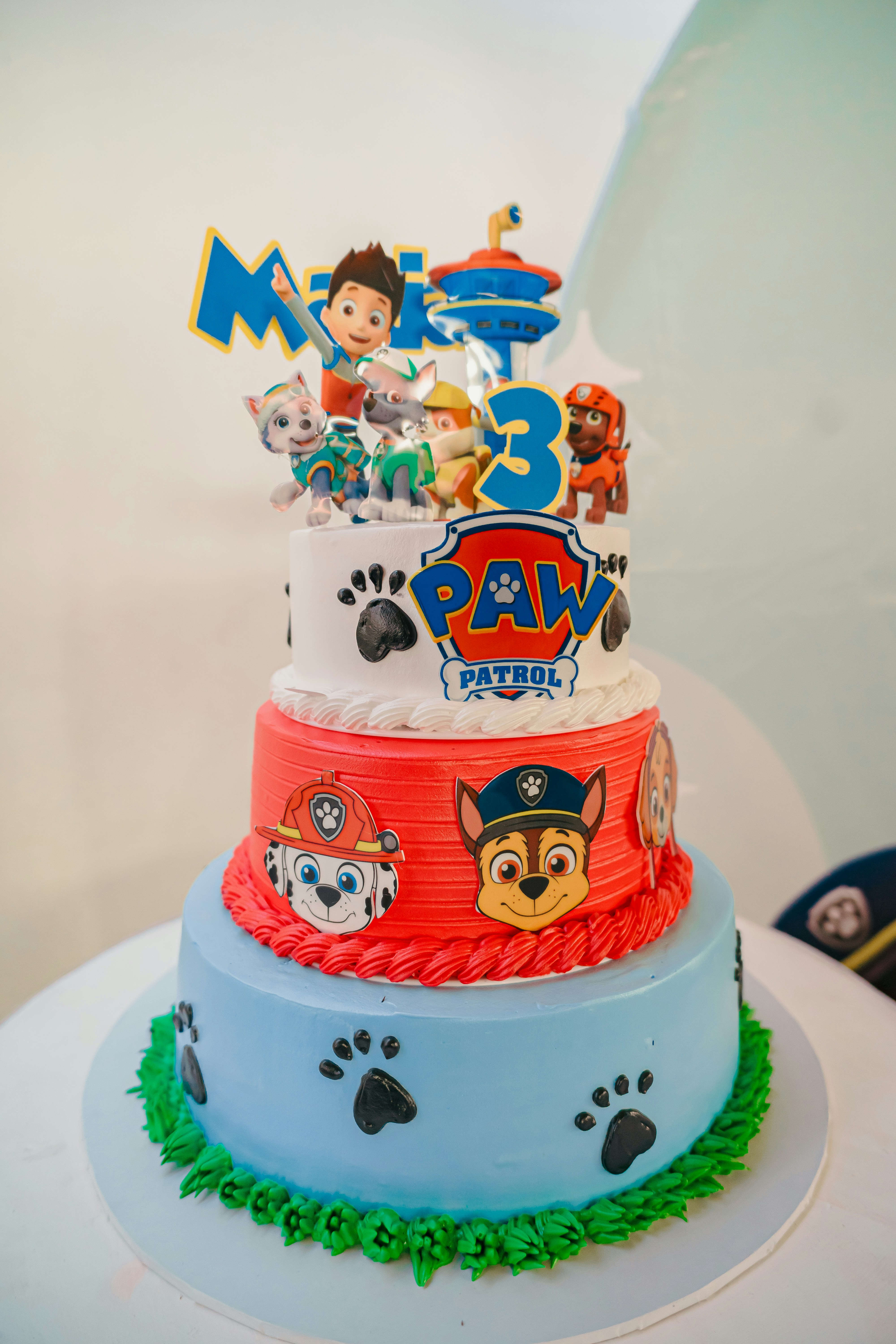 Custom themed three-tier cake with sculpted character details