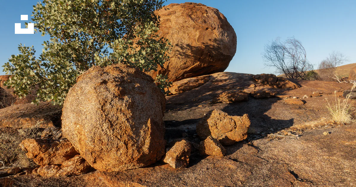 Large Round Rocks Large round boulders on a rocky, arid landscape. photo – Free Travel ...