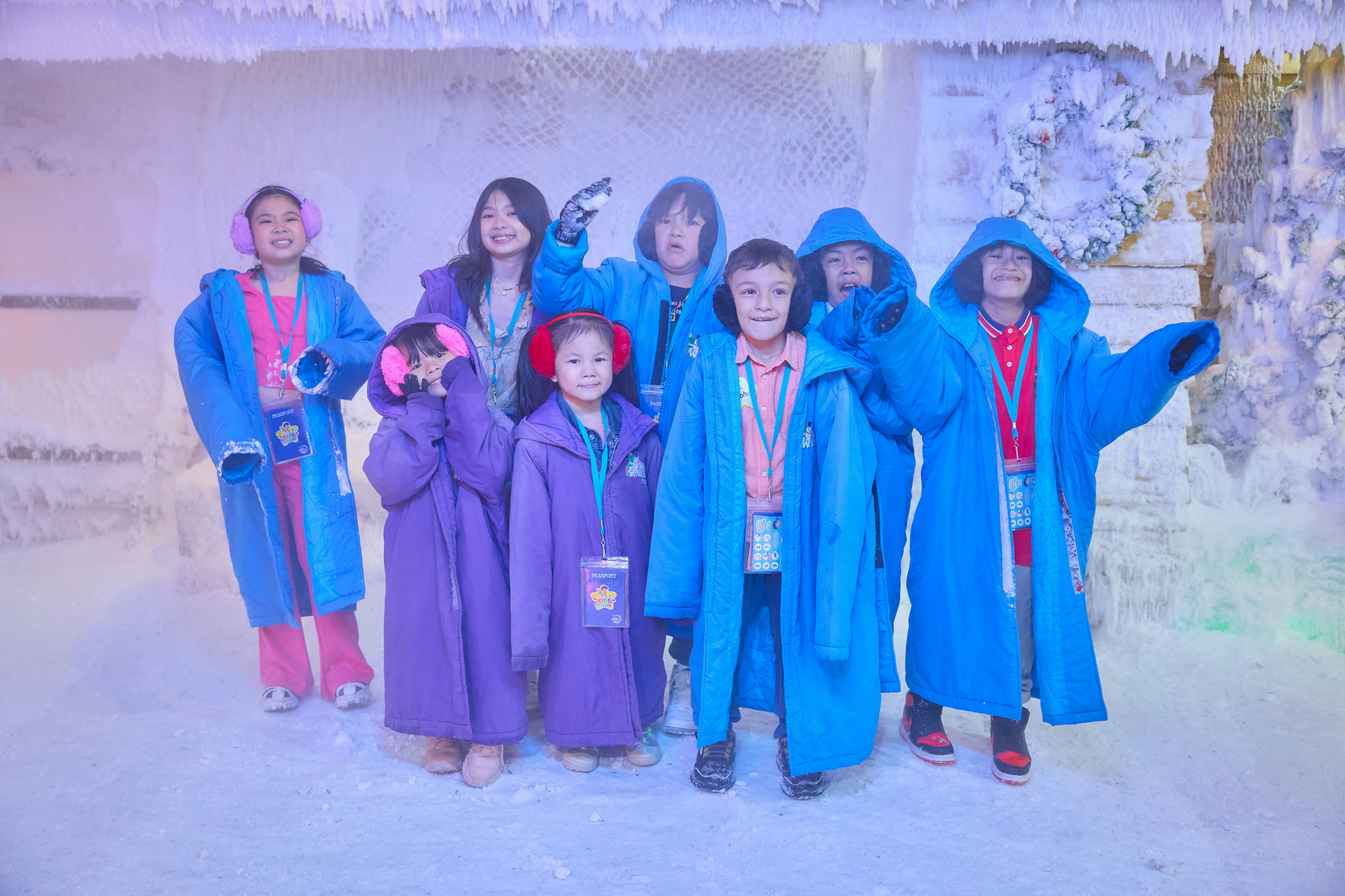 Guests enjoying colorful ice structures