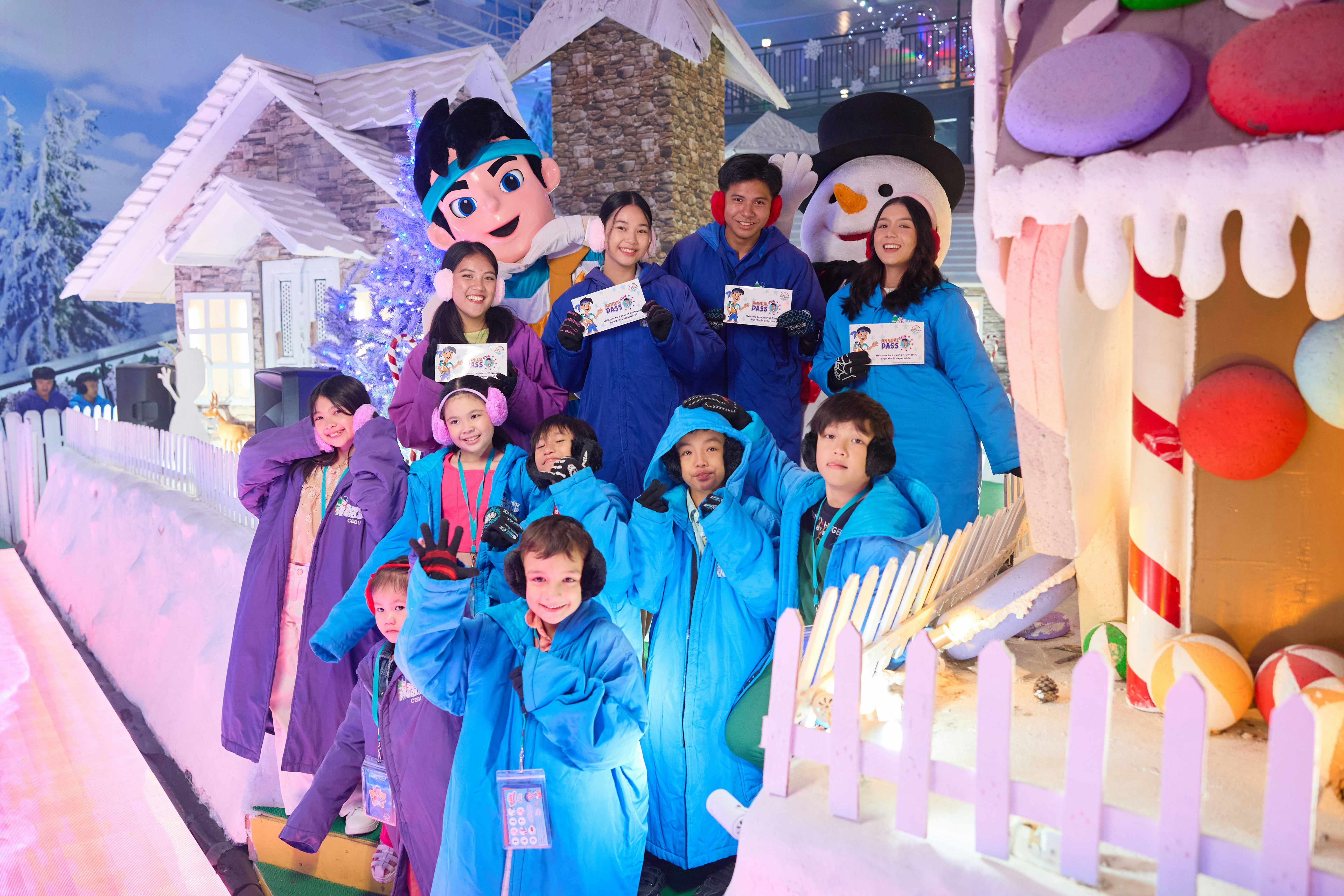 Guests posing in front of ice walls