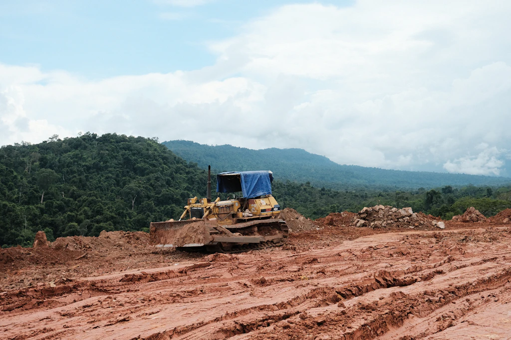 Tractor working on land clearing and site preparation in Florida