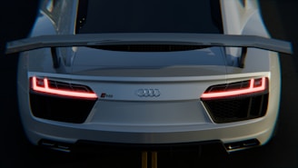 Rear view of a white audi r8 sports car