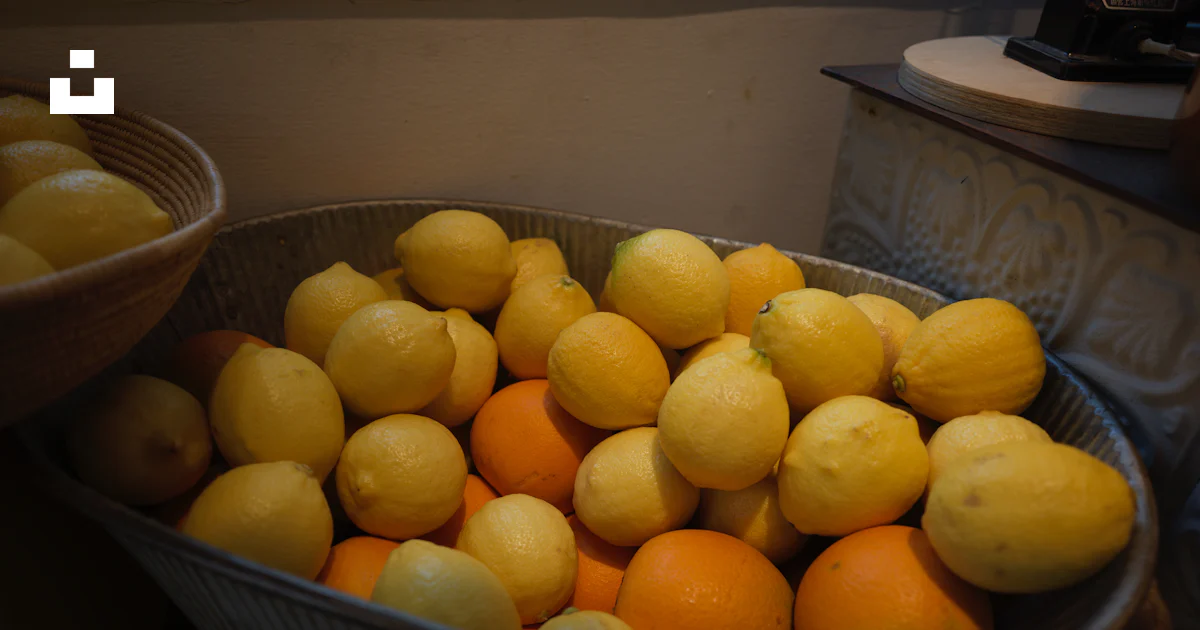 Lemon Intub A metal tub filled with lemons and oranges. photo – Free Food Image on ...