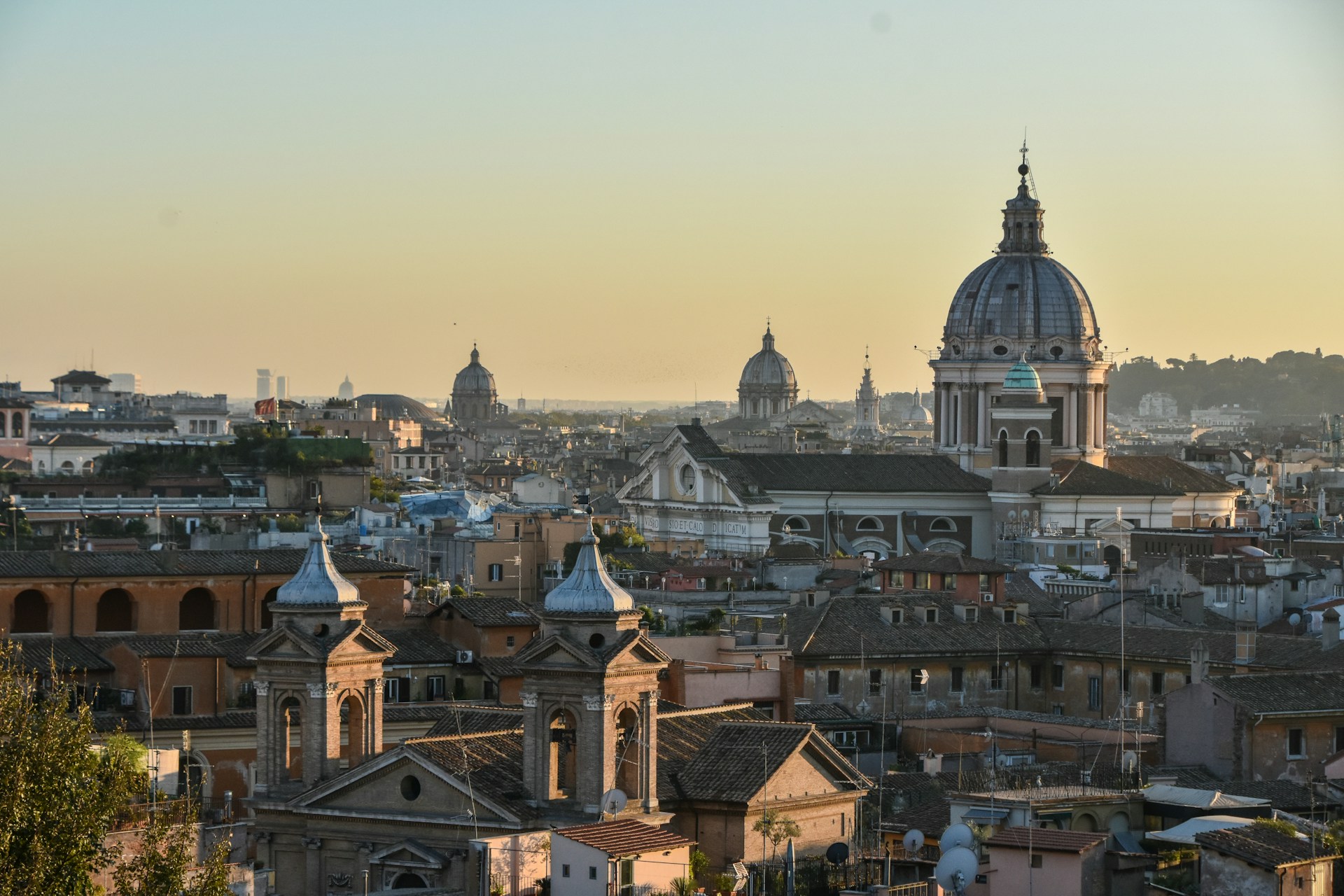 Rooftops and domes of Rome at sunset
