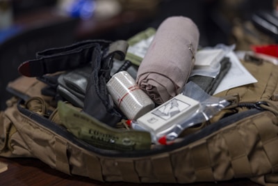 First aid kit contents with bandages and medical supplies