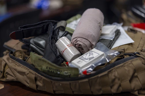 First aid kit contents with bandages and medical supplies