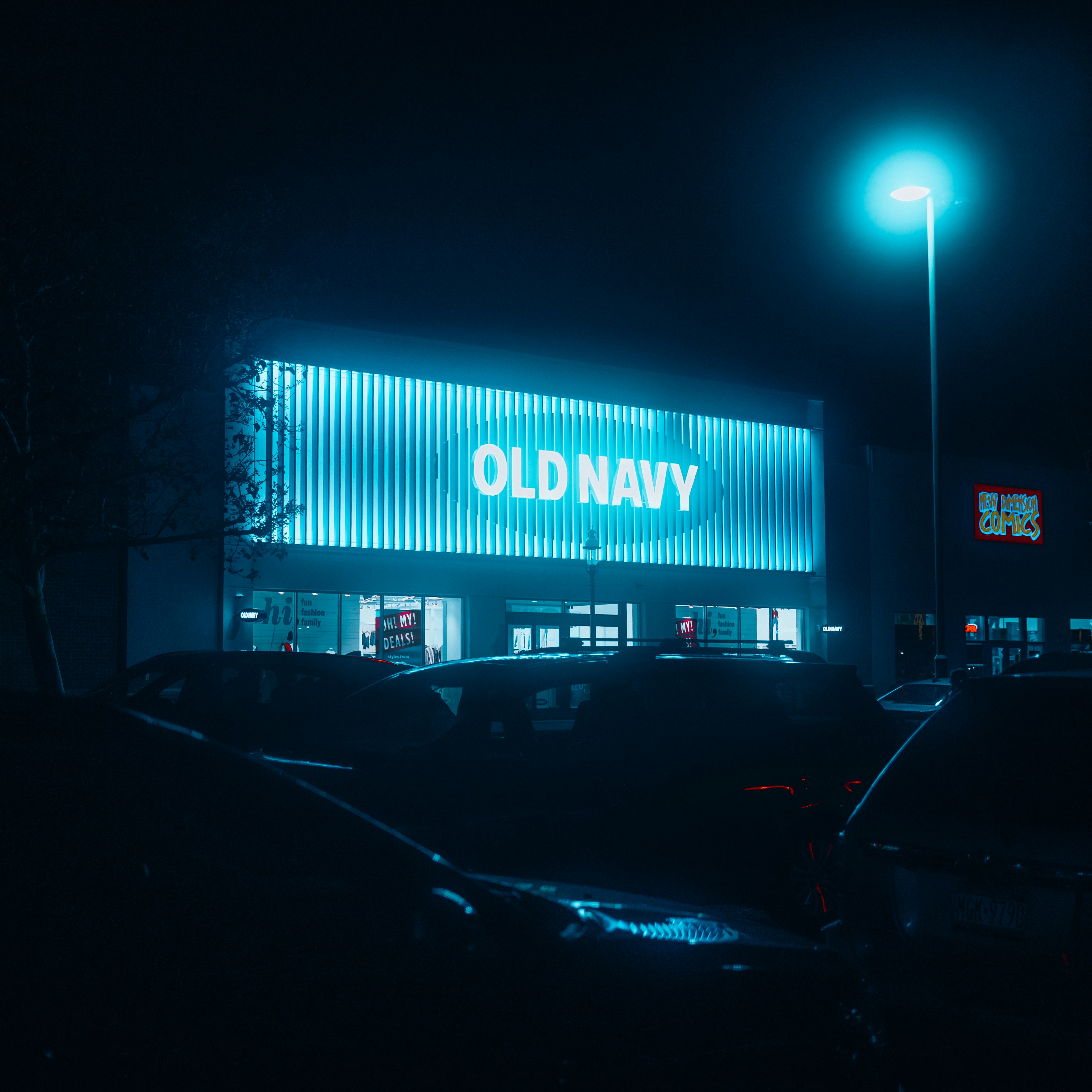 Old navy store illuminated at night