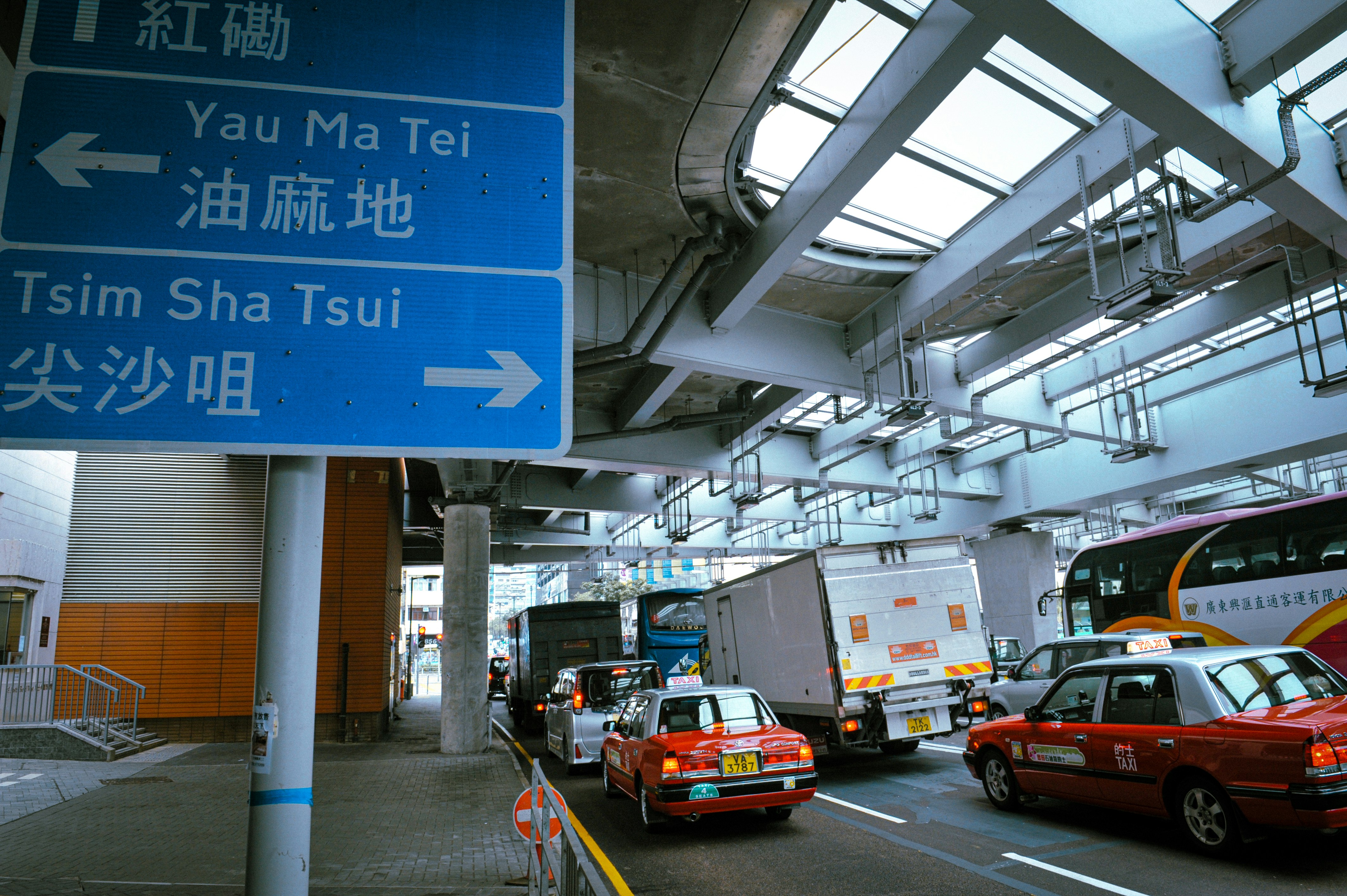 Traffic jam with street signs in hong kong