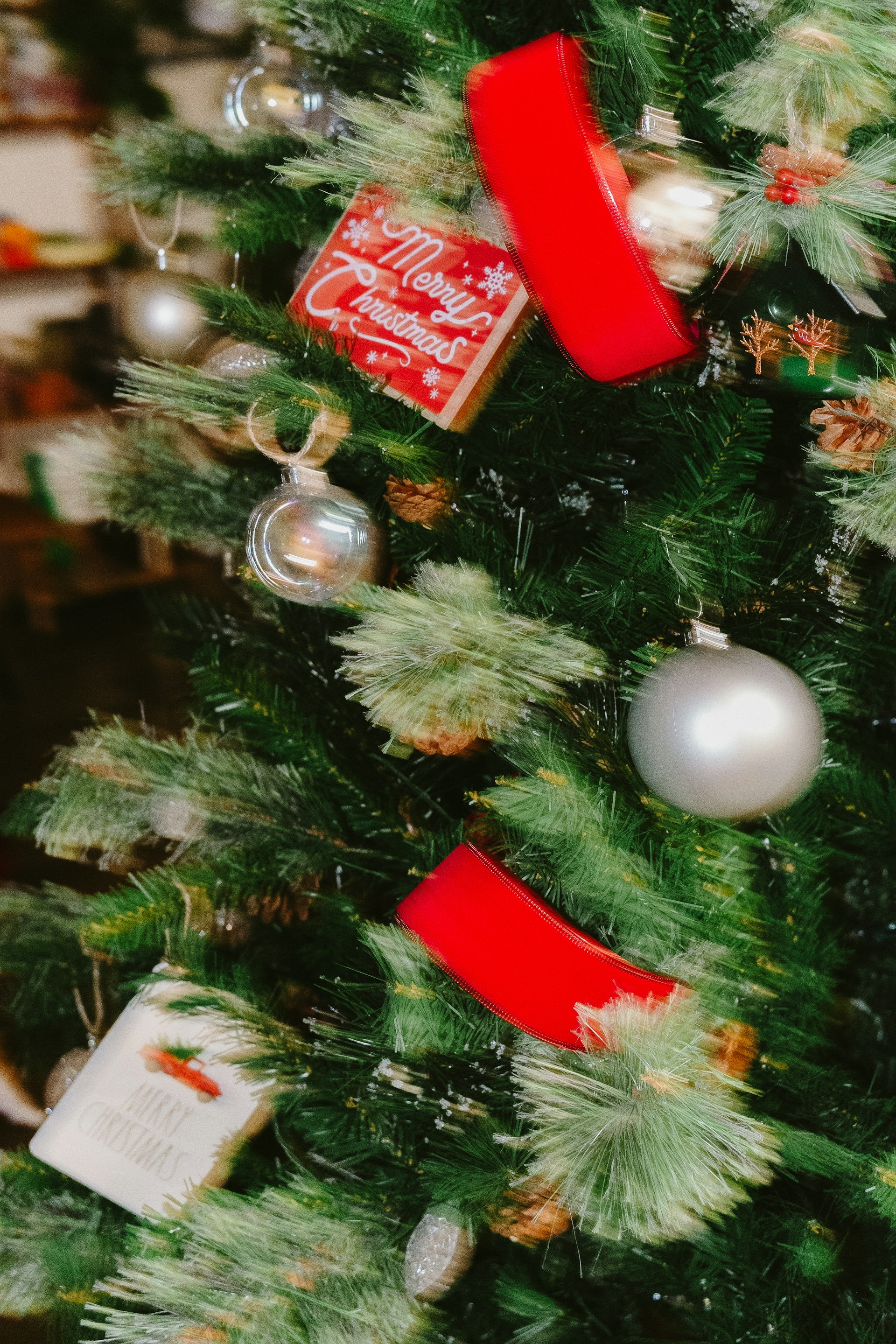 Decorated christmas tree with ornaments and ribbon