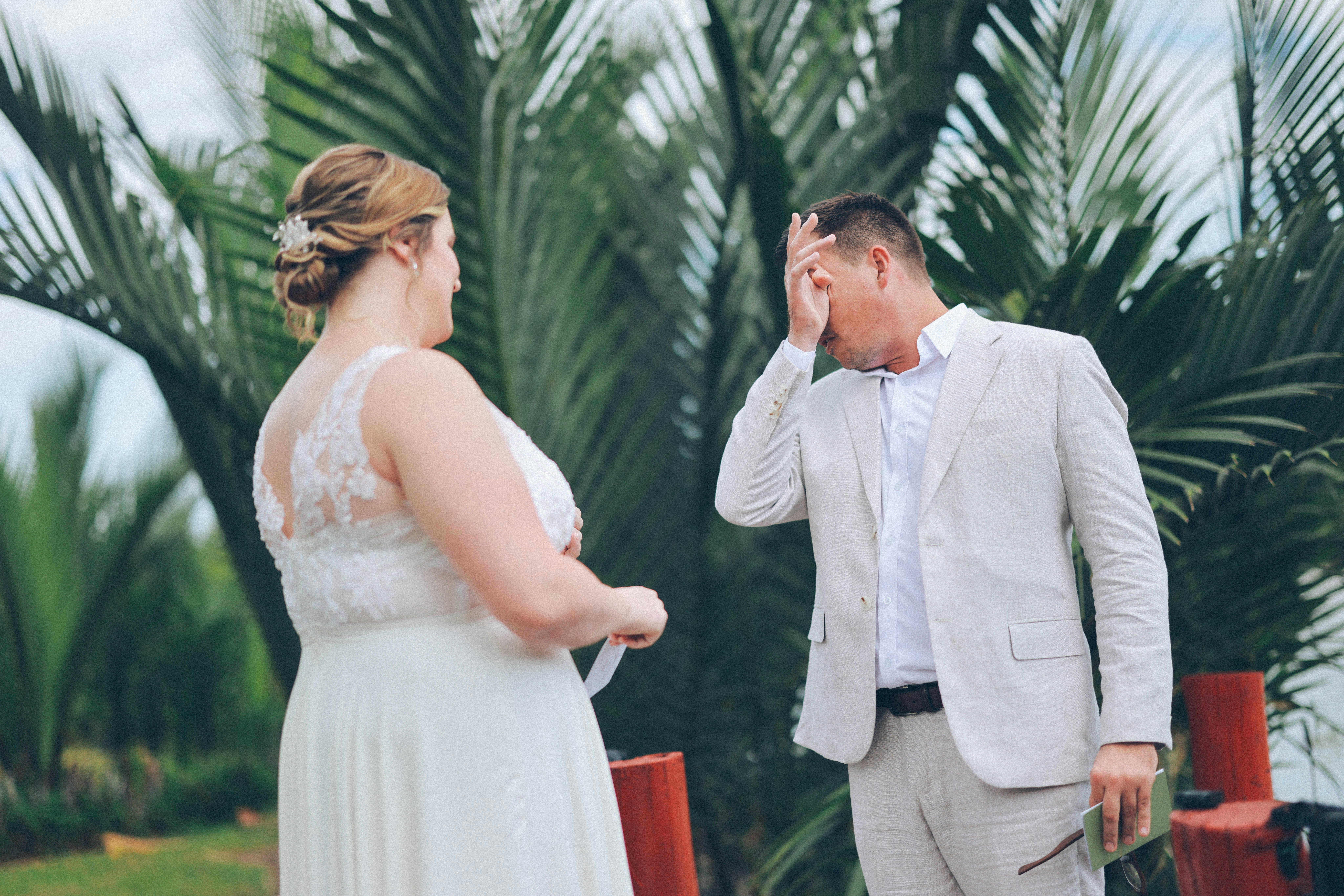 Groom reacts emotionally to bride's vows