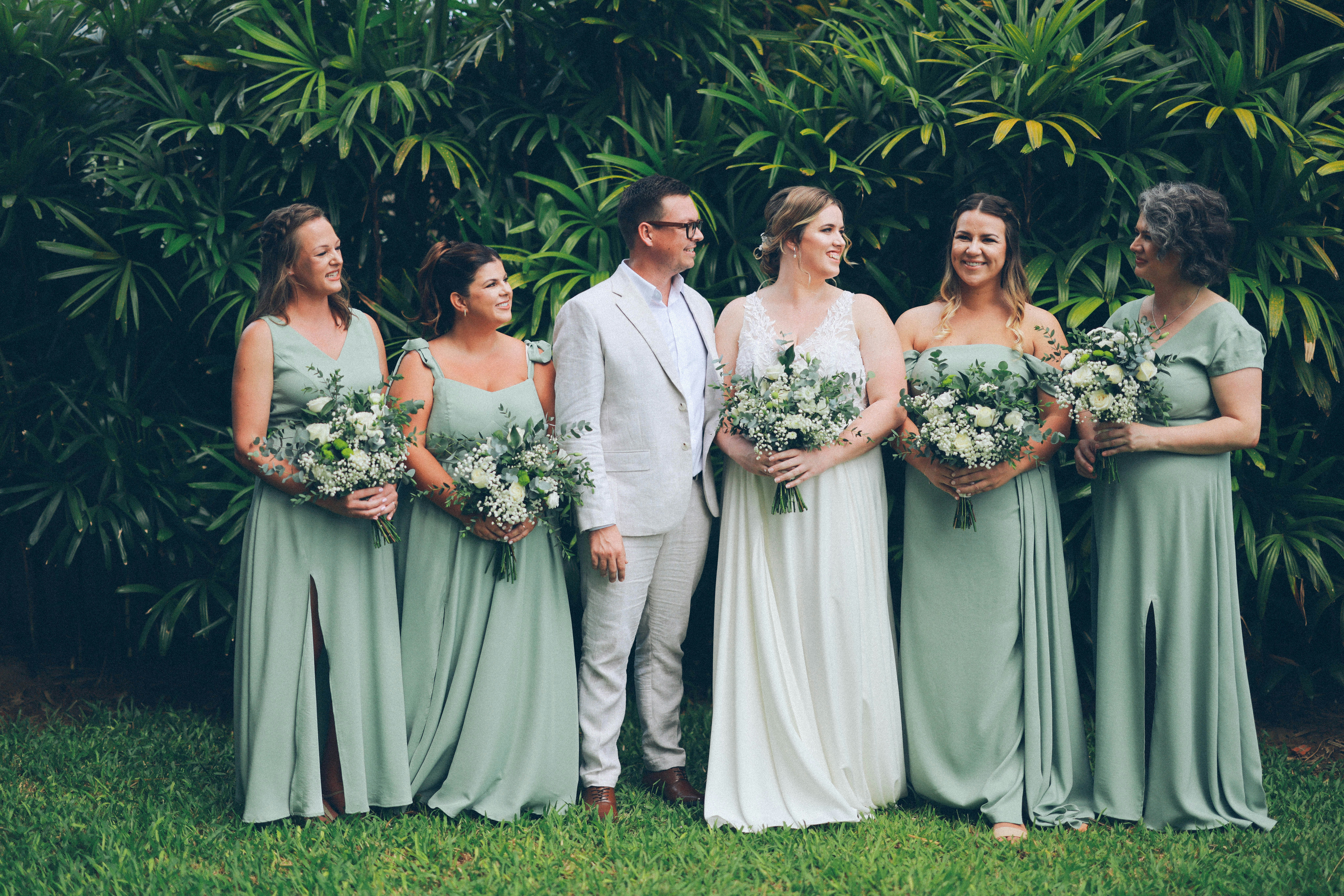 Bridesmaids in elegant matching dresses for wedding parties